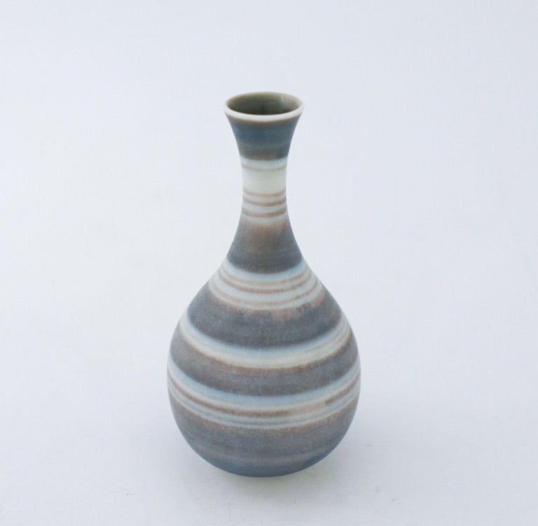 A miniature vase designed by Gunnar Nylund at Rörstrand. It is 9.5 cm high and in very good condition, it is marked as 1st quality. 

