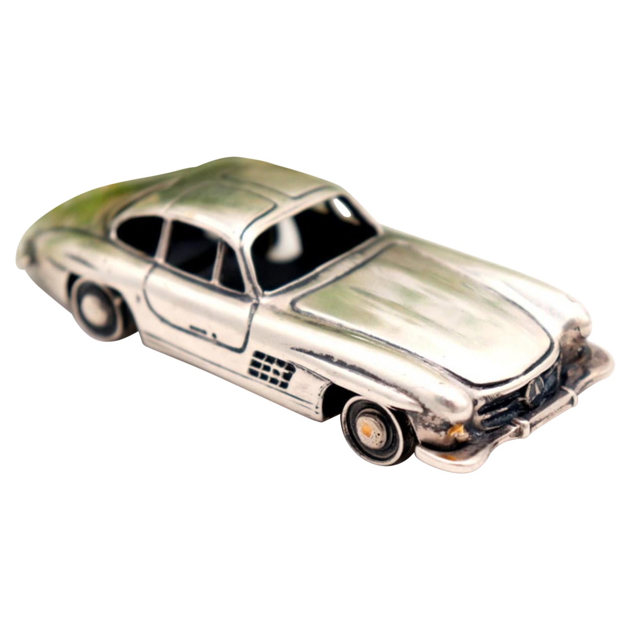 Miniature vintage car (Mercedes) with perfect reliefs