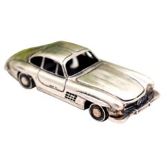 Miniature vintage car (Mercedes) with perfect reliefs