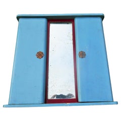 Miniature wardrobe. Oxidized mirror