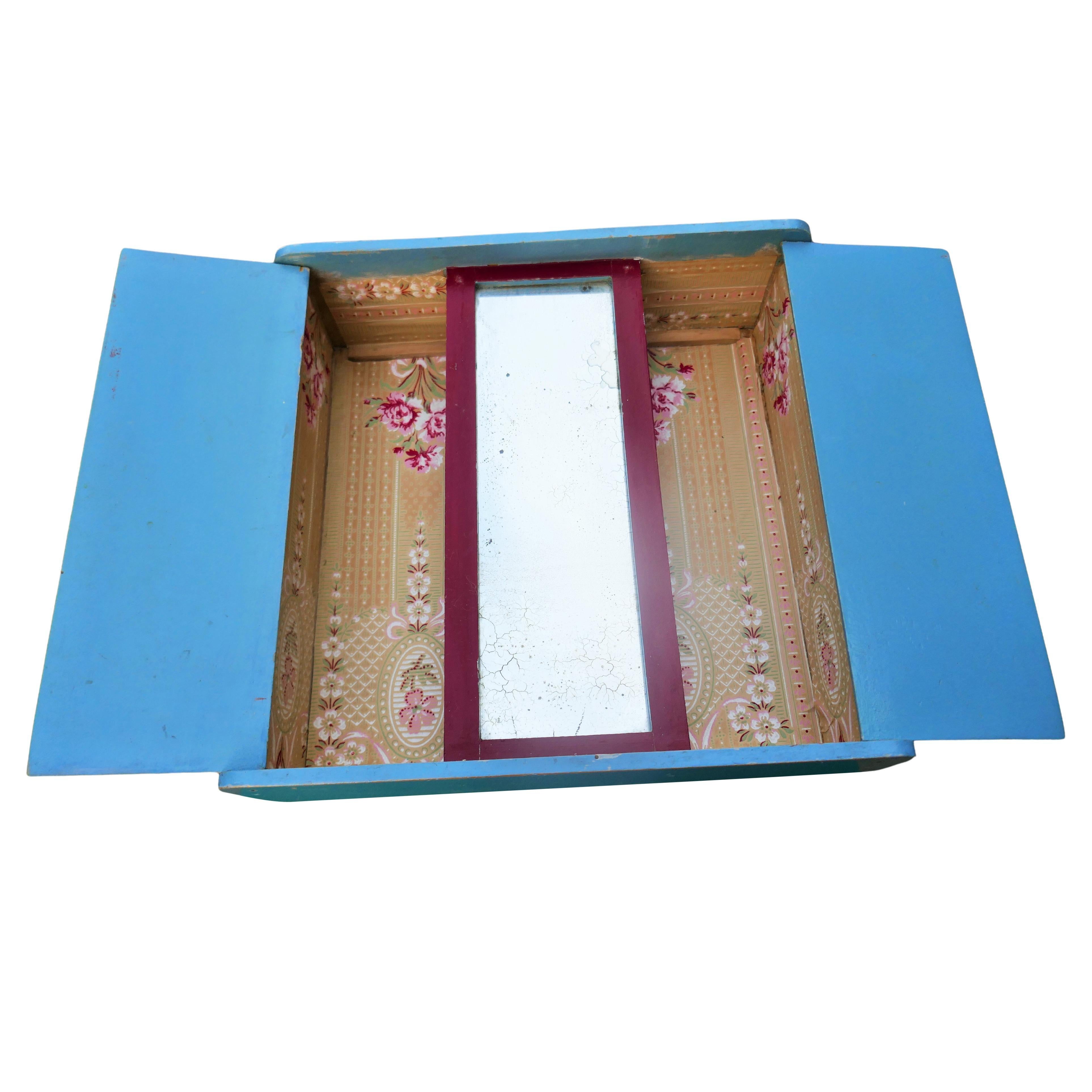 Mid-20th Century Miniature wardrobe. Oxidized mirror For Sale