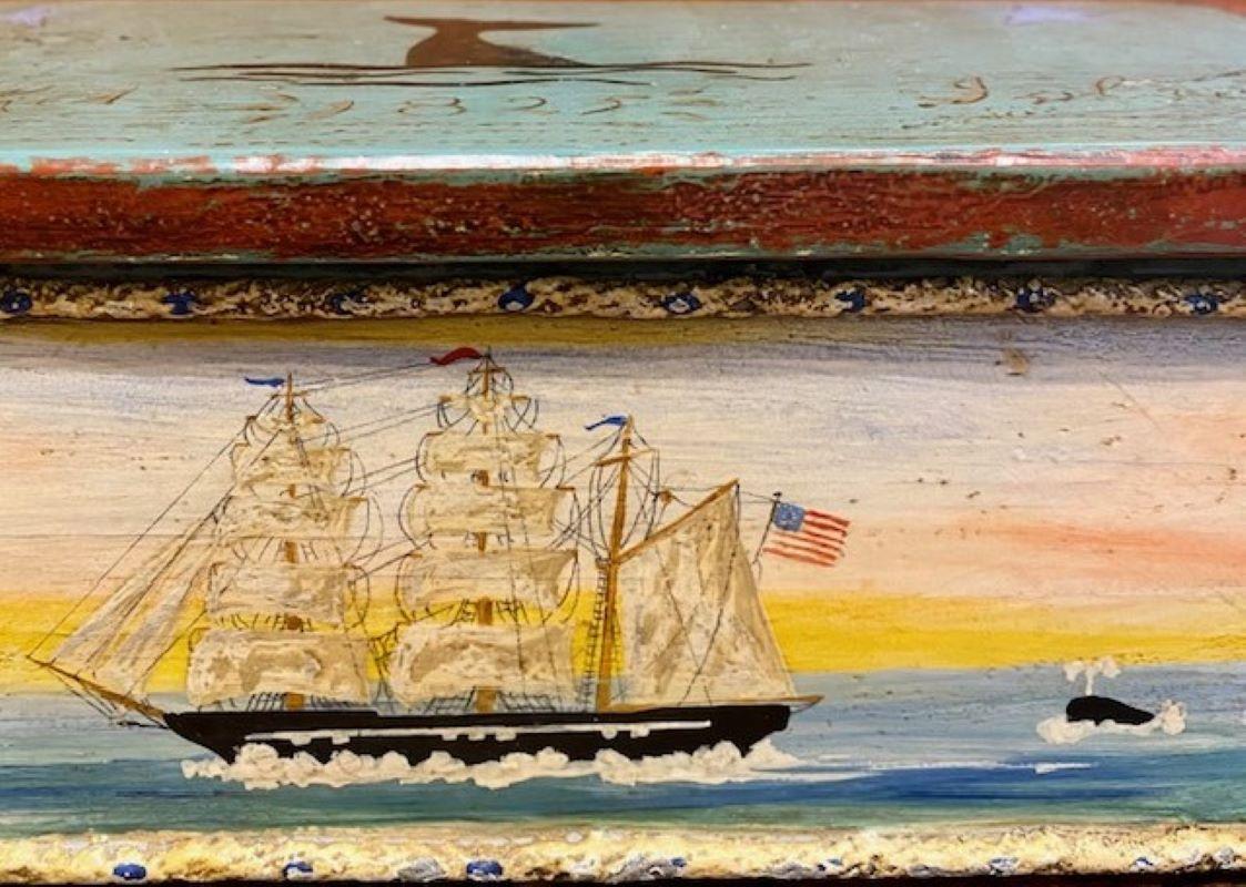 Antique Miniature Whaling Decorated Sea Chest, circa 1920s, the top painted with the tail flukes of a sounding whale, flanked by two blue stars and the legend 