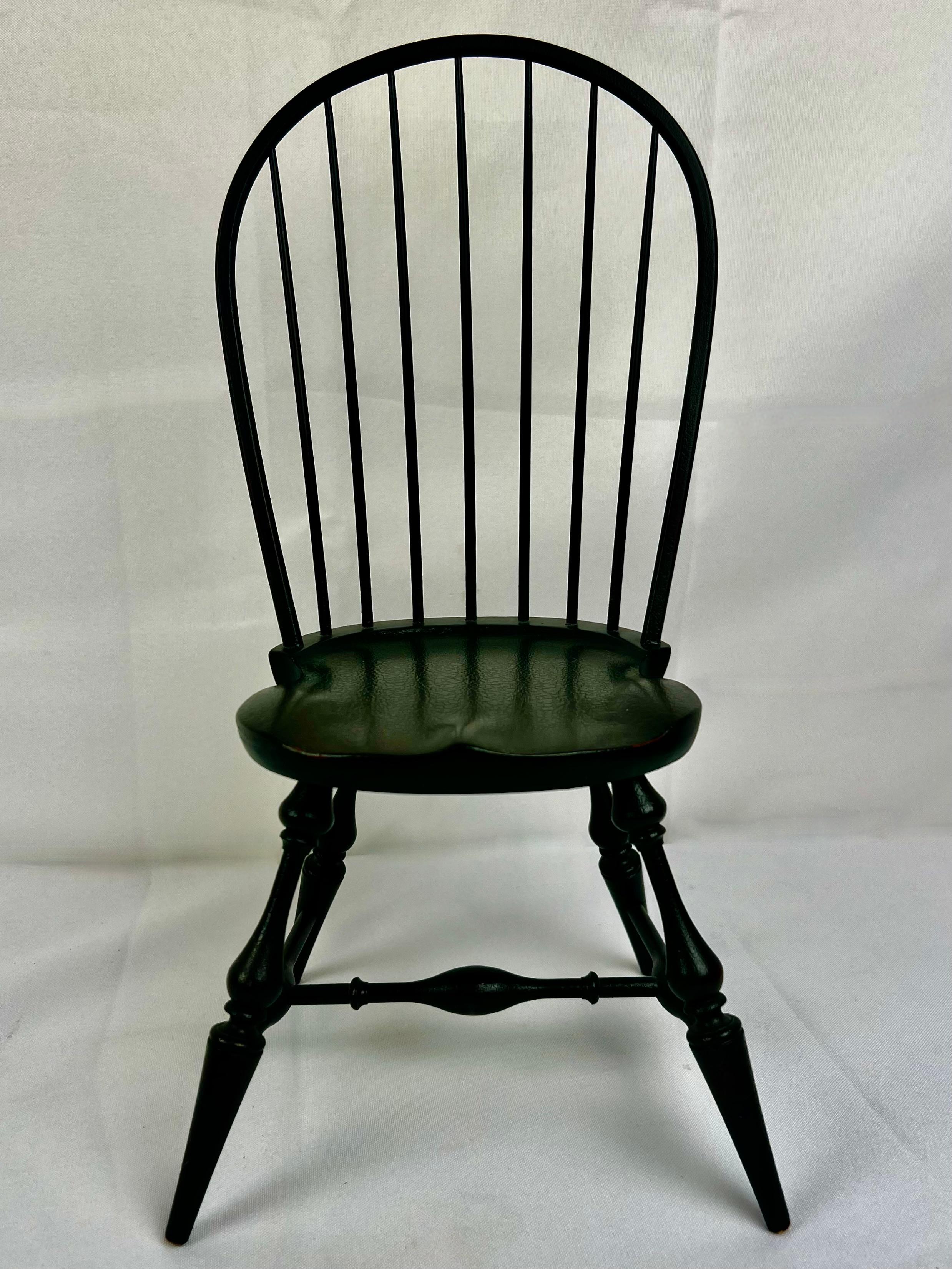 Fine miniature Windsor side chair stamped clearly on the underside Riverbend Chair Co., Ohio.  Painted a handsome essex green.  The windsor form is finely executed with turned legs and stretchers.  This collectors item is in nearly new