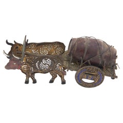 Miniature yoke of oxen in gilded silver with filigree mesh