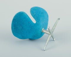 Miniatures of the "Swan" chair and Circular table designed by Arne Jacobsen.