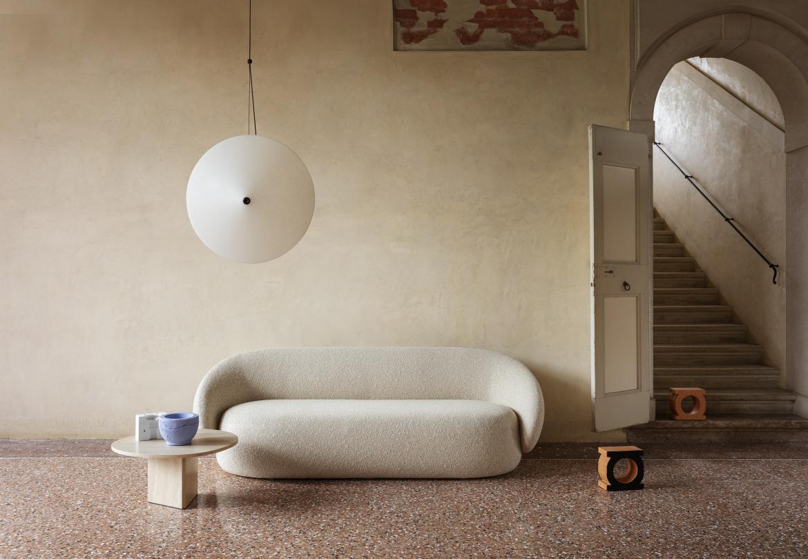 Nebulona has become a sofa and now it’s named Nebulone. You can find the same drop-shaped armrests, but now they embrace an extended and seriously welcoming seat, to relax yourself freely or in good company.

Available in several fabric