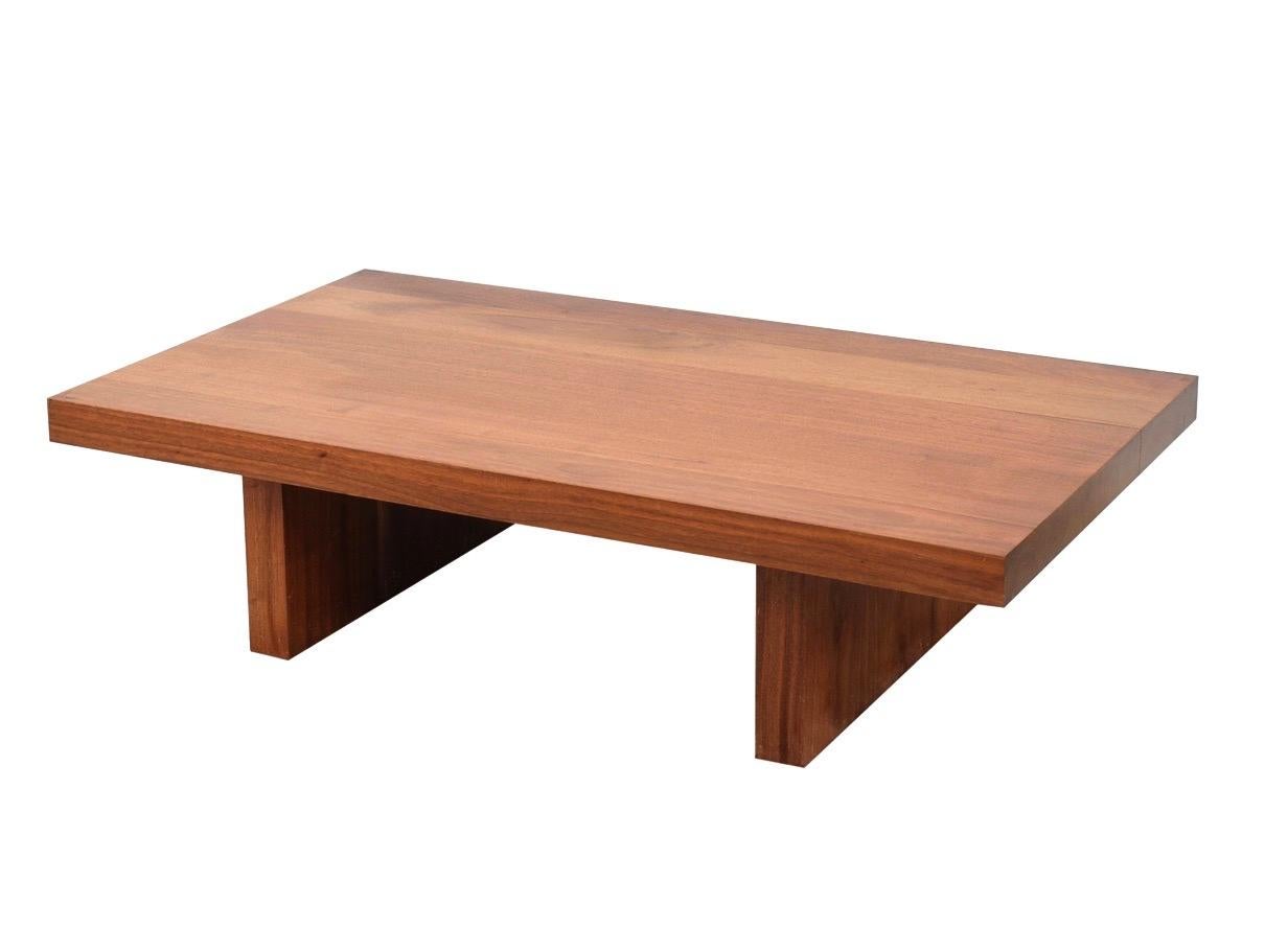 Minimal Claro walnut coffee table, organic modern handmade, Hudson Furniture, NYC. Solid walnut wood.  Not veneer. Hand sculptured, sculptural, post and lintel structure. MSRP of over 11,000 USD.

In 2004, Barlas Baylar founded Hudson Furniture