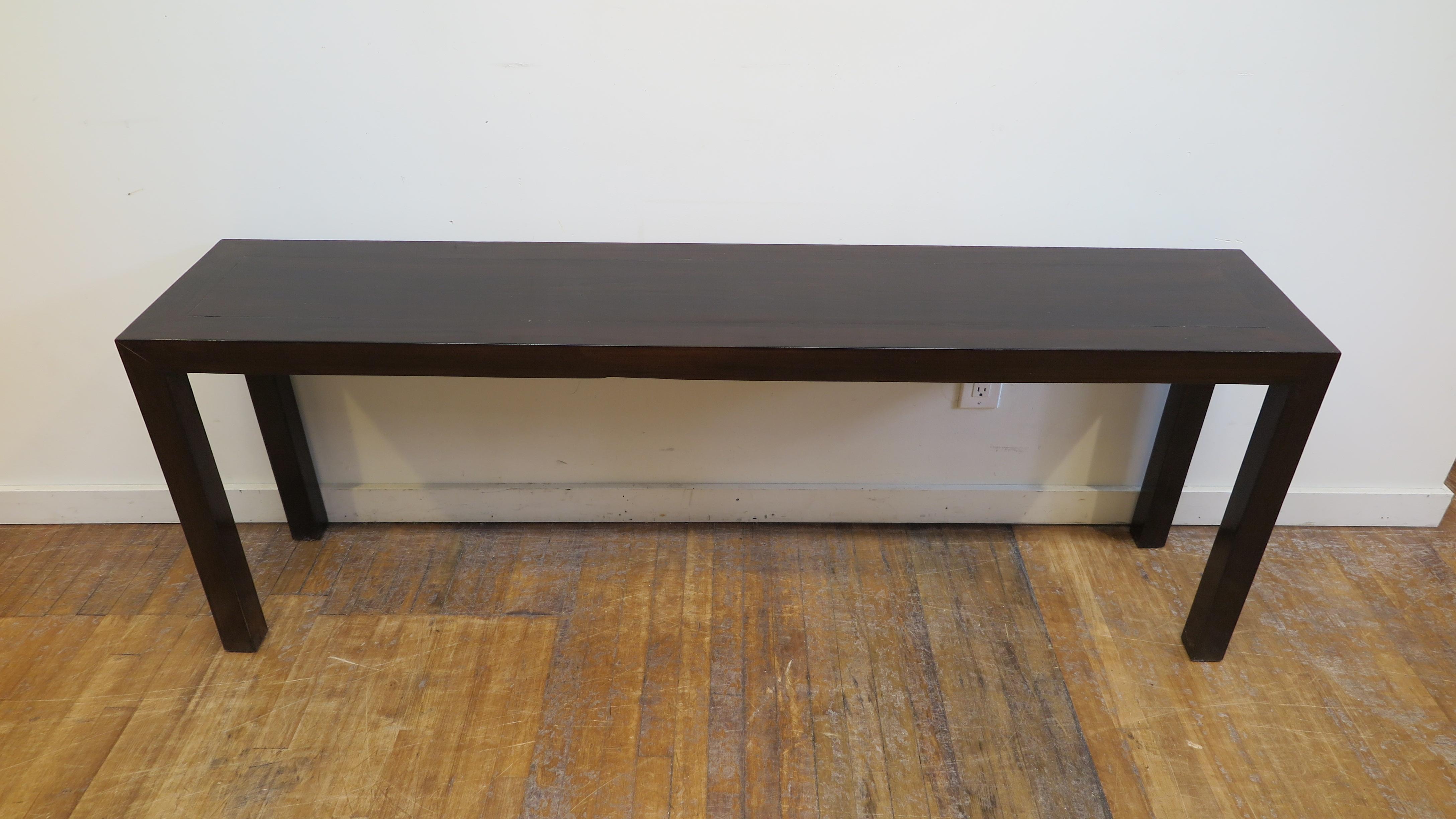 Minimal Console Table. Elmwood Parsons table console. A modernist low console table having four, flush, square legs equal in thickness to the top. Nice Minimal Vintage Console table. 
In good condition, lightly used.