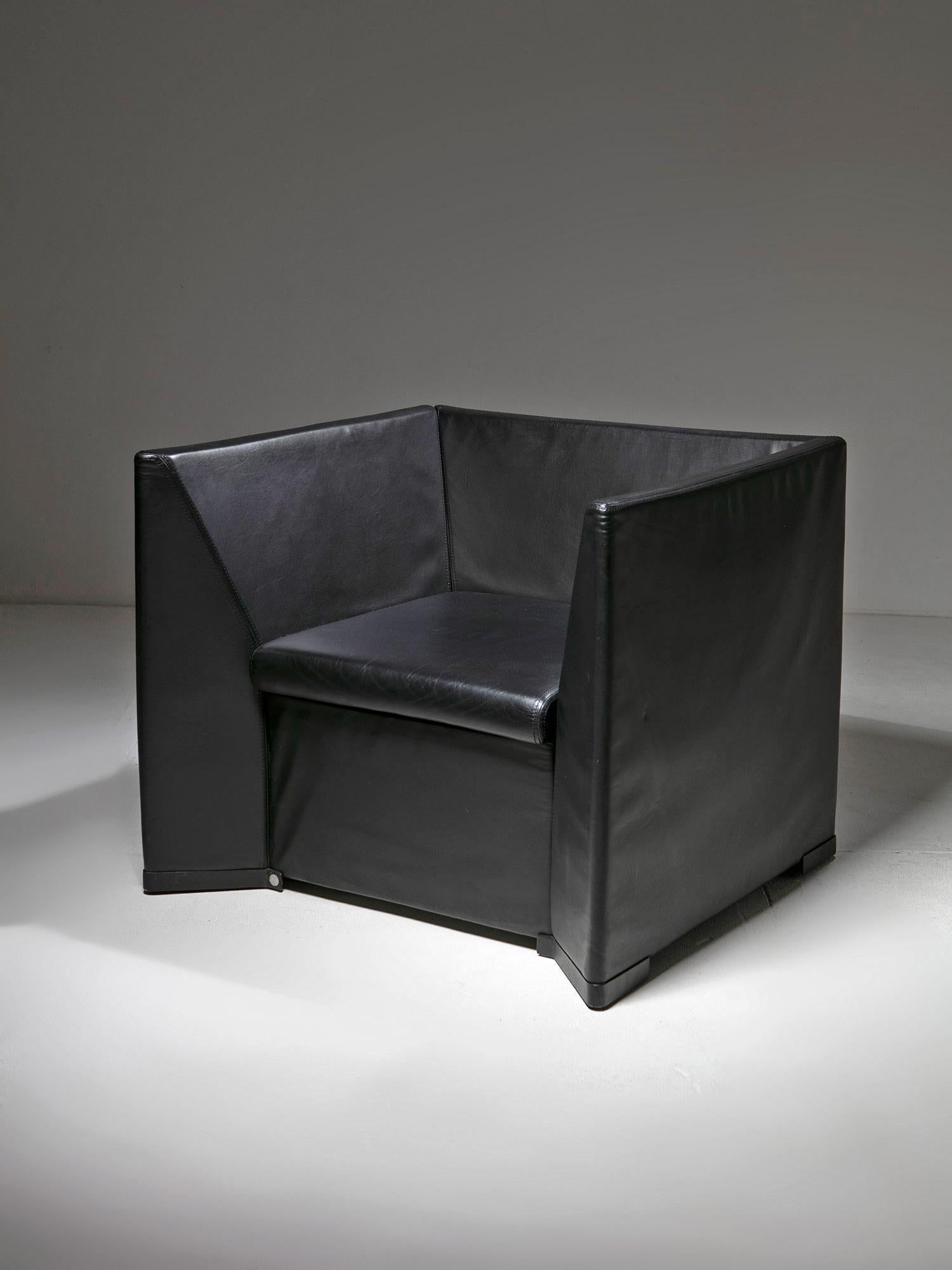 Rare leather armchair model D101 by Tecno.
Originally custom-conceived by Centro Progetti Tecno for a private bank, the model was later put in serial production.
Pure squared proportioned fully covered with black leather
