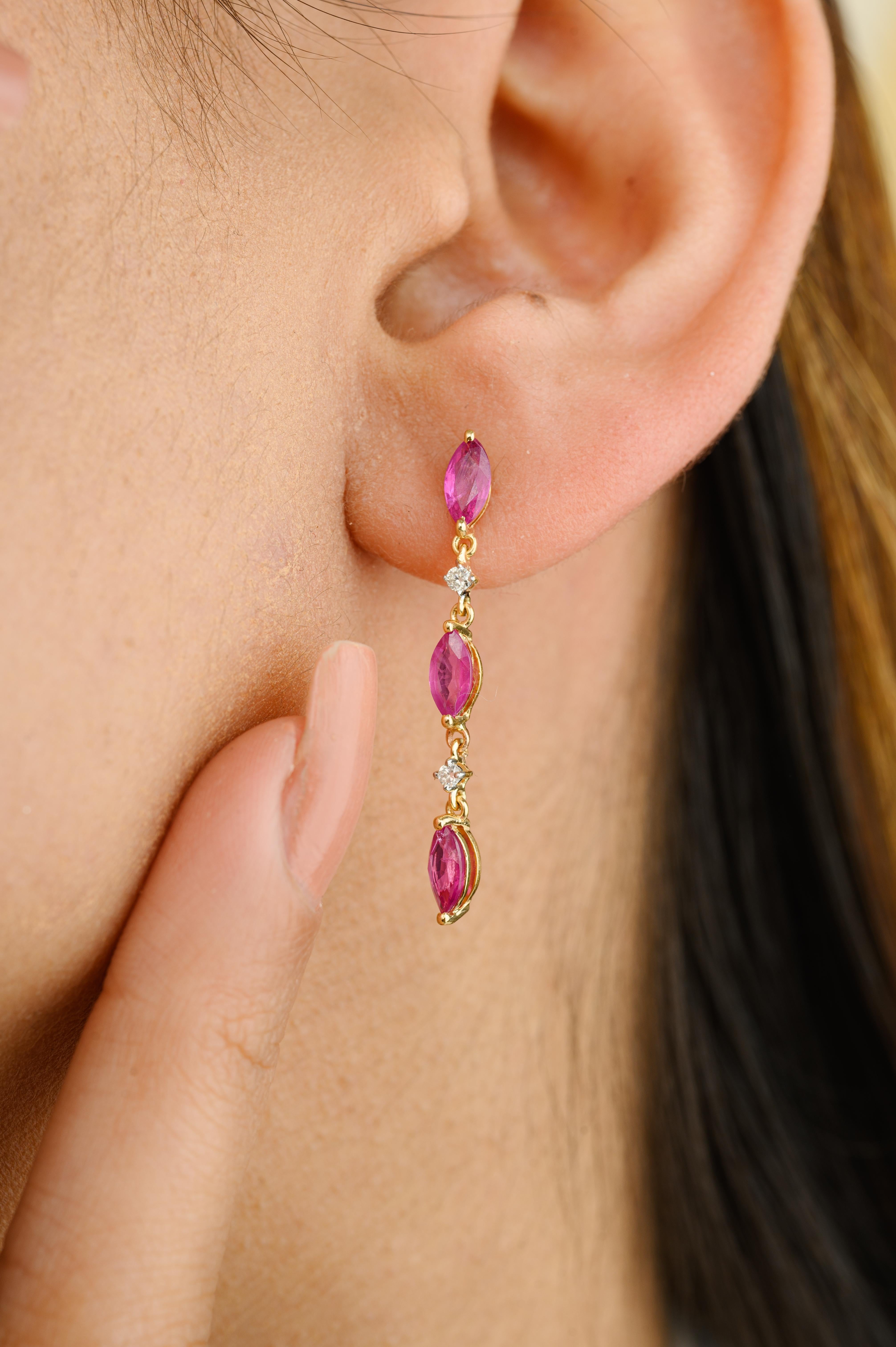 Minimal Marquise Ruby Diamond Dangle Earrings in 18K Gold to make a statement with your look. You shall need dangle earrings to make a statement with your look. These earrings create a sparkling, luxurious look featuring marquise cut ruby.
Ruby