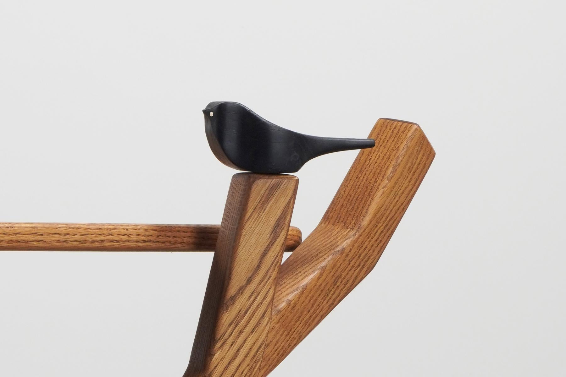 TOTEM collector's edition console table is a sculptural and organic statement  in Solid Oak wood, created inspired by the exemplary beauty and winding ascents of trees in nature, with an uncomplicated minimal aesthetic. The console table holds a