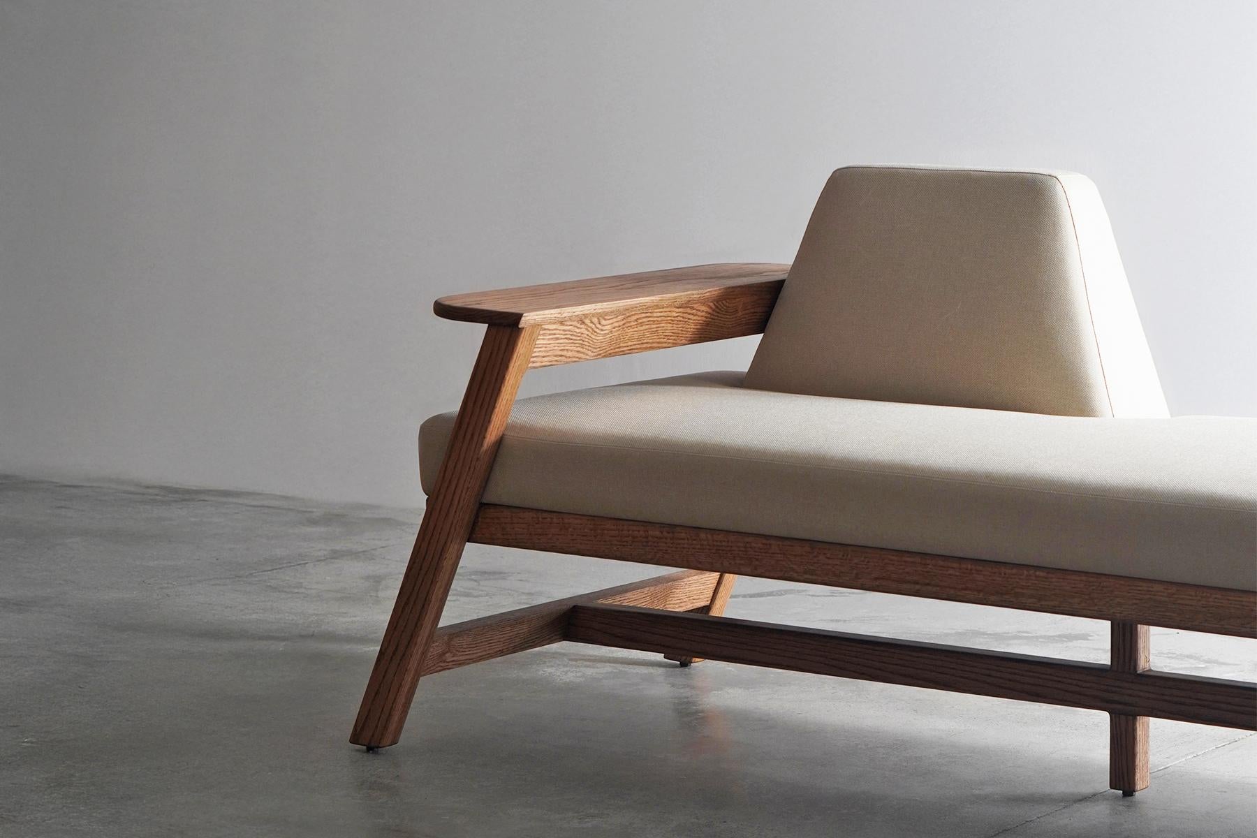 Mid-Century Modern Minimal Modern Oak wood upholstered Bench with bolster, brass and wooden armrest For Sale