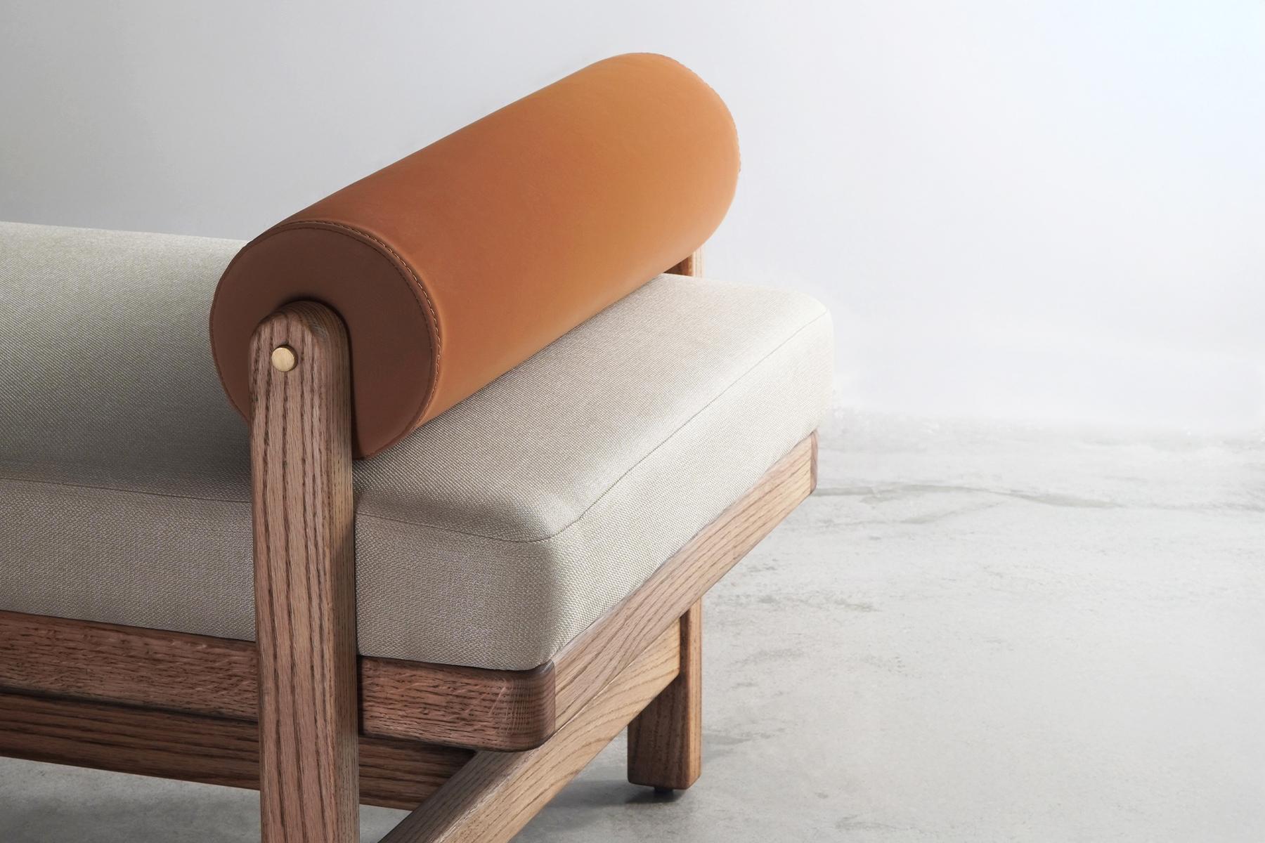 Asian Minimal Modern Oak wood upholstered Bench with bolster, brass and wooden armrest For Sale