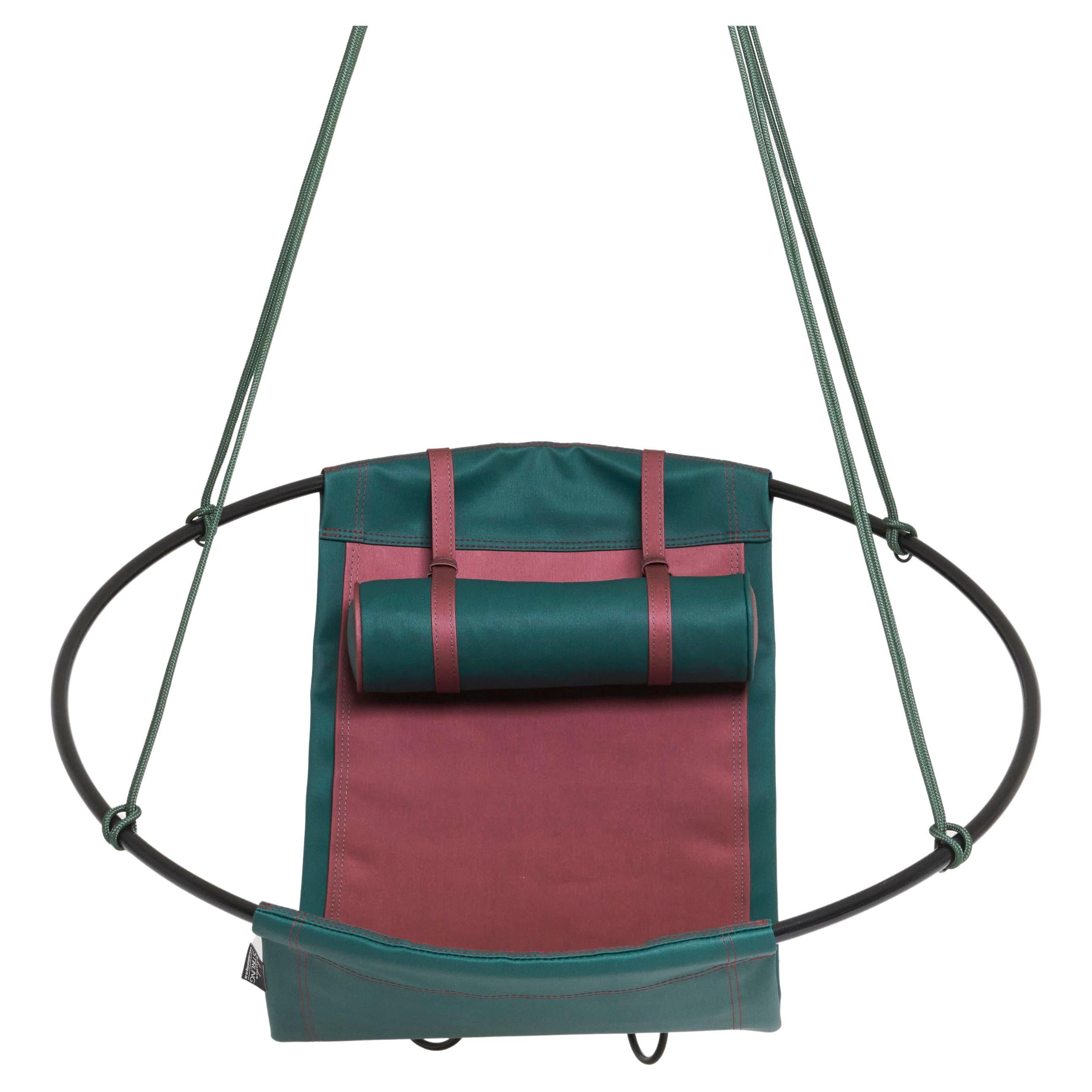 Chaise suspendue d'extérieur minimaliste et moderne en forme de boucle, Rubin and Forest