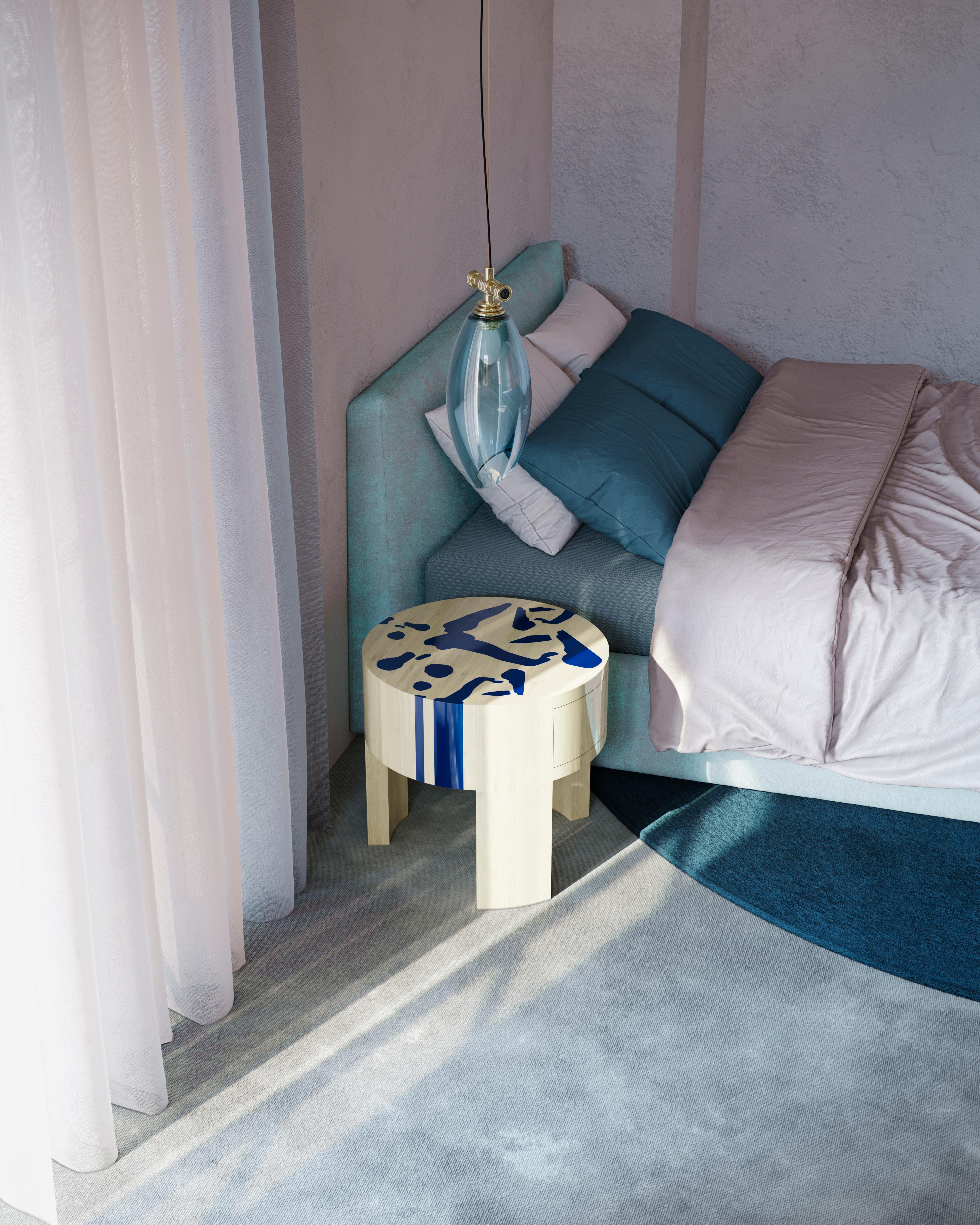 circular bedside table with drawer
