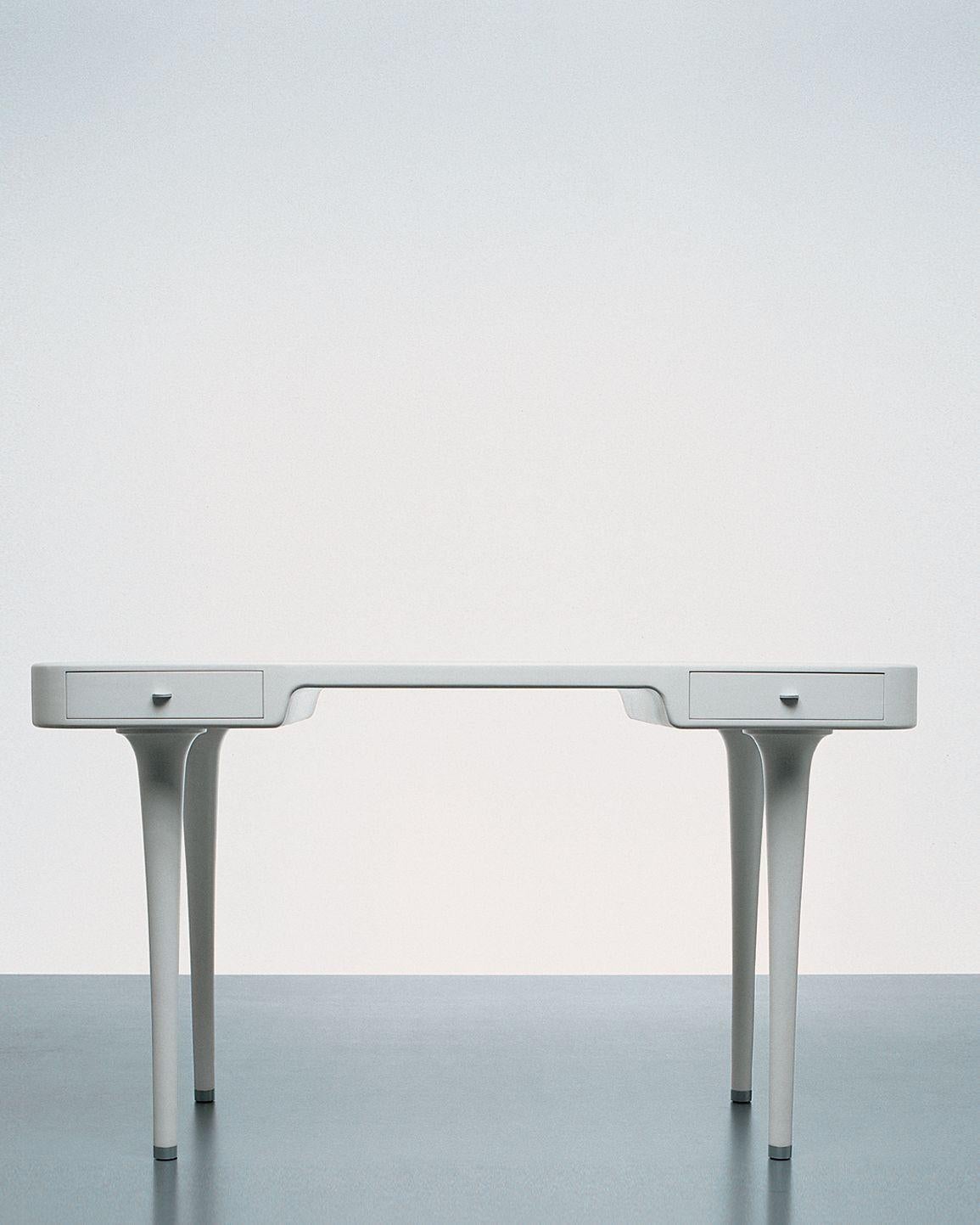 Minimal modern white Riga desk by Marc Newson for Cappellini, contemporary postmodern writing console

Cappellini Riga desk. An evergreen wooden writing desk designed by Marc Newson for Cappellini and dated 1995 that seems to live evergreen. The