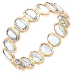 Minimal Oval 3.23 Ct Aquamarine Eternity Band Ring in 18K Yellow Gold