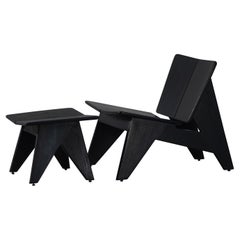 Minimal solid wood black BUTTERFLY accent chair with footstool by Esvee Atelier