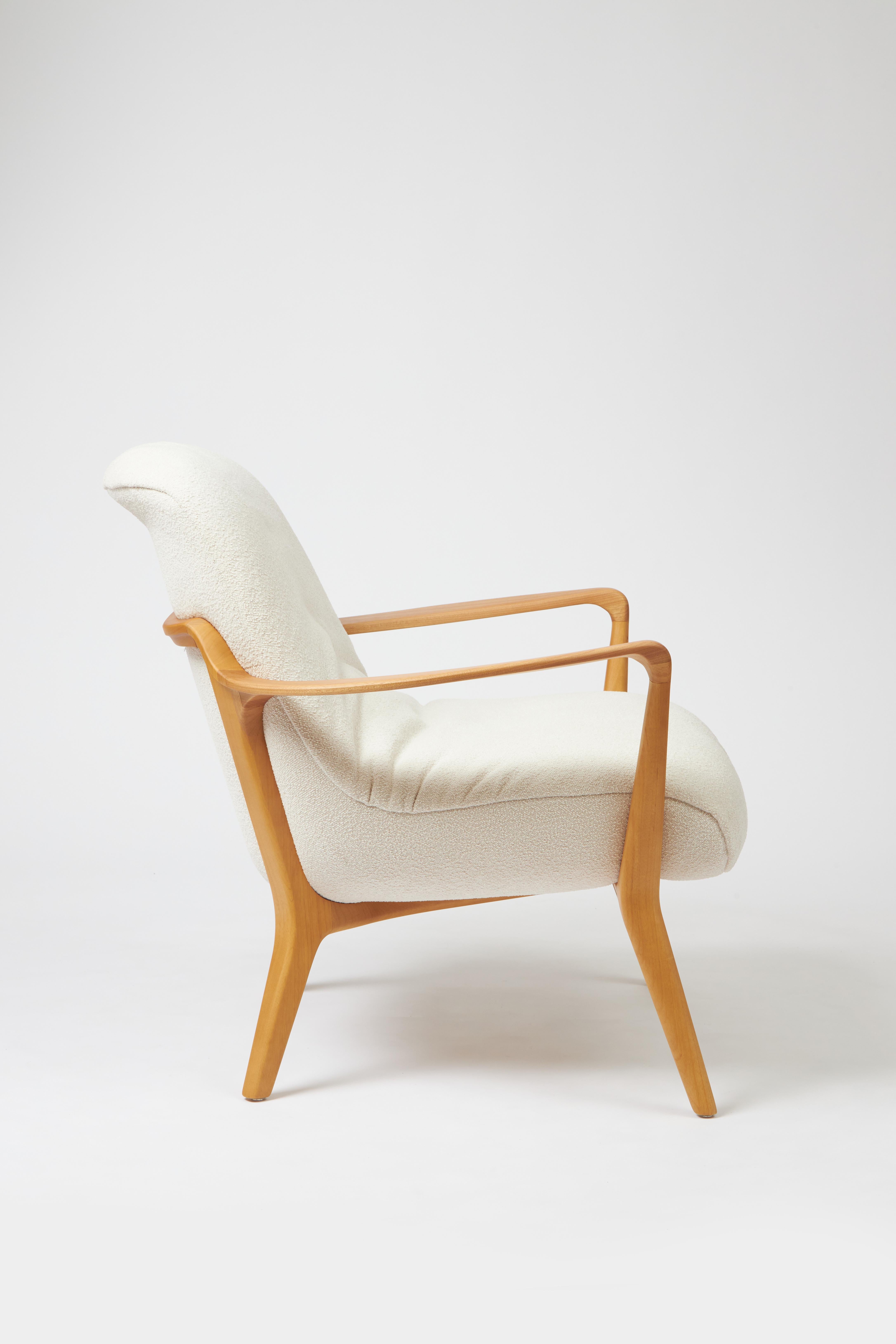 Post-Modern Minimal Style Insigne Armchair Sculpted in walnut solid wood finish, textiles For Sale