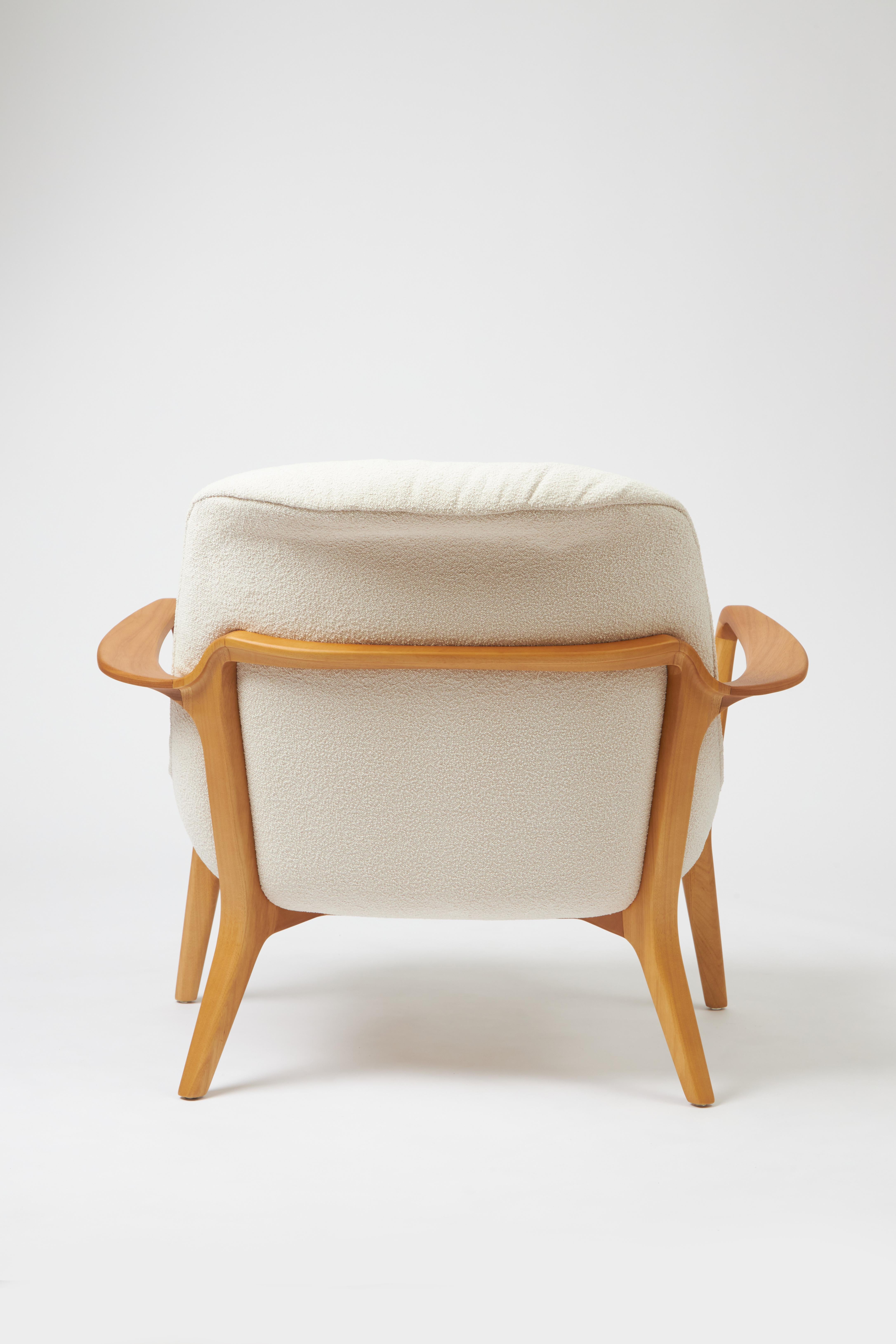Caning Minimal Style Insigne Armchair Sculpted in walnut solid wood finish, textiles For Sale