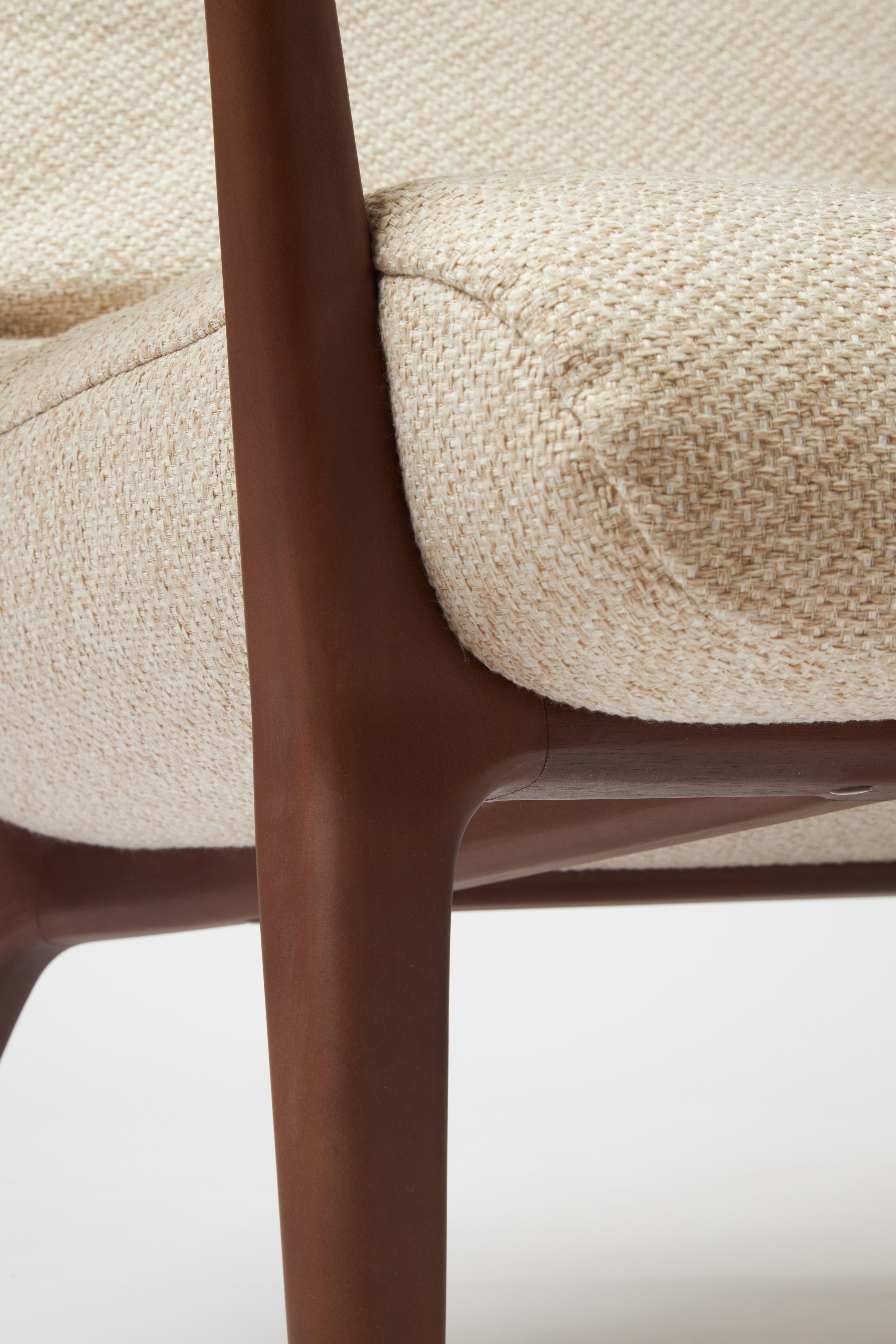 Minimal Style Insigne Armchair Sculpted in walnut wood finish, textiles seating For Sale 2
