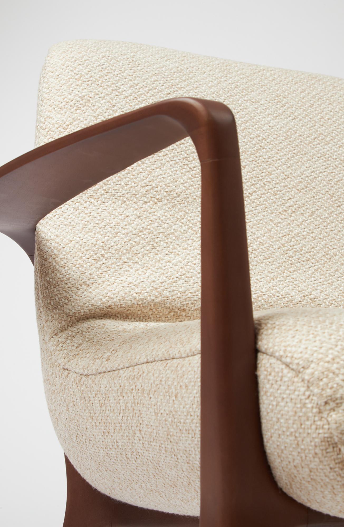 Minimal Style Insigne Armchair Sculpted in walnut wood finish, textiles seating For Sale 4