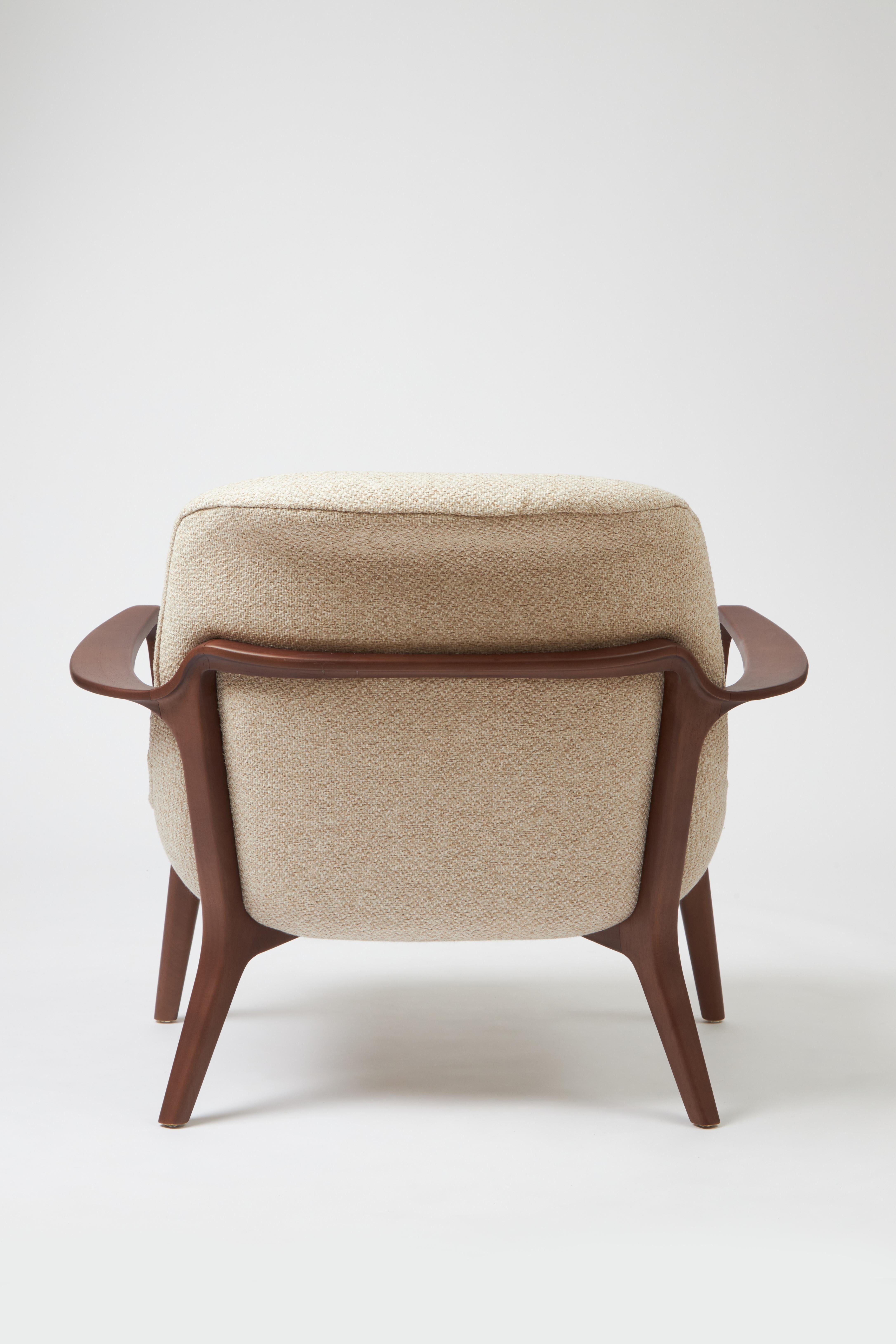 Post-Modern Minimal Style Insigne Armchair Sculpted in walnut wood finish, textiles seating For Sale