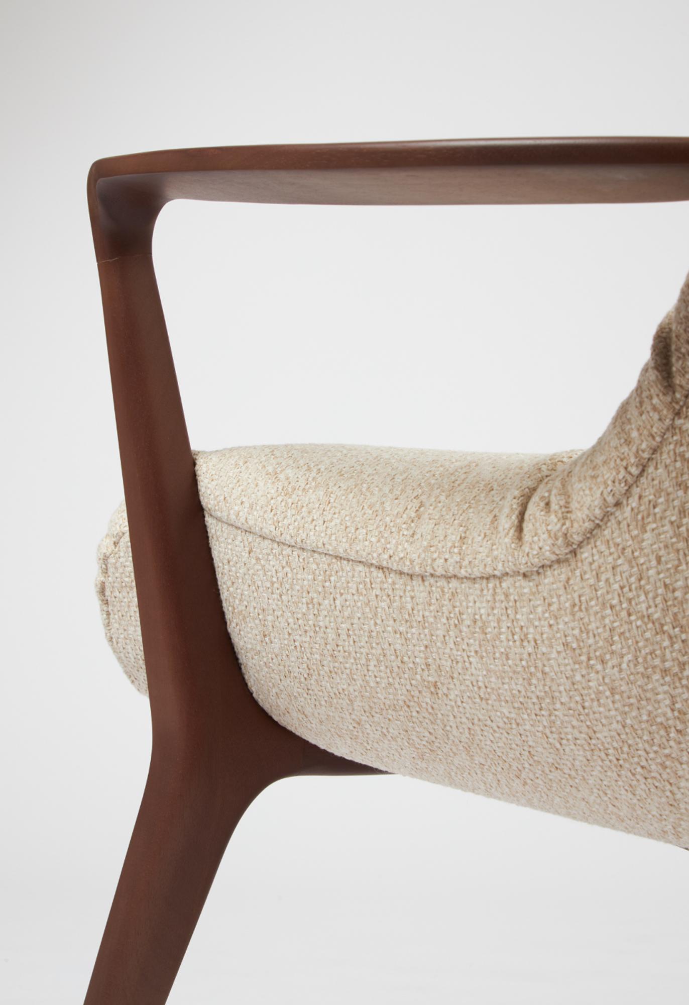 Leather Minimal Style Insigne Armchair Sculpted in walnut wood finish, textiles seating For Sale