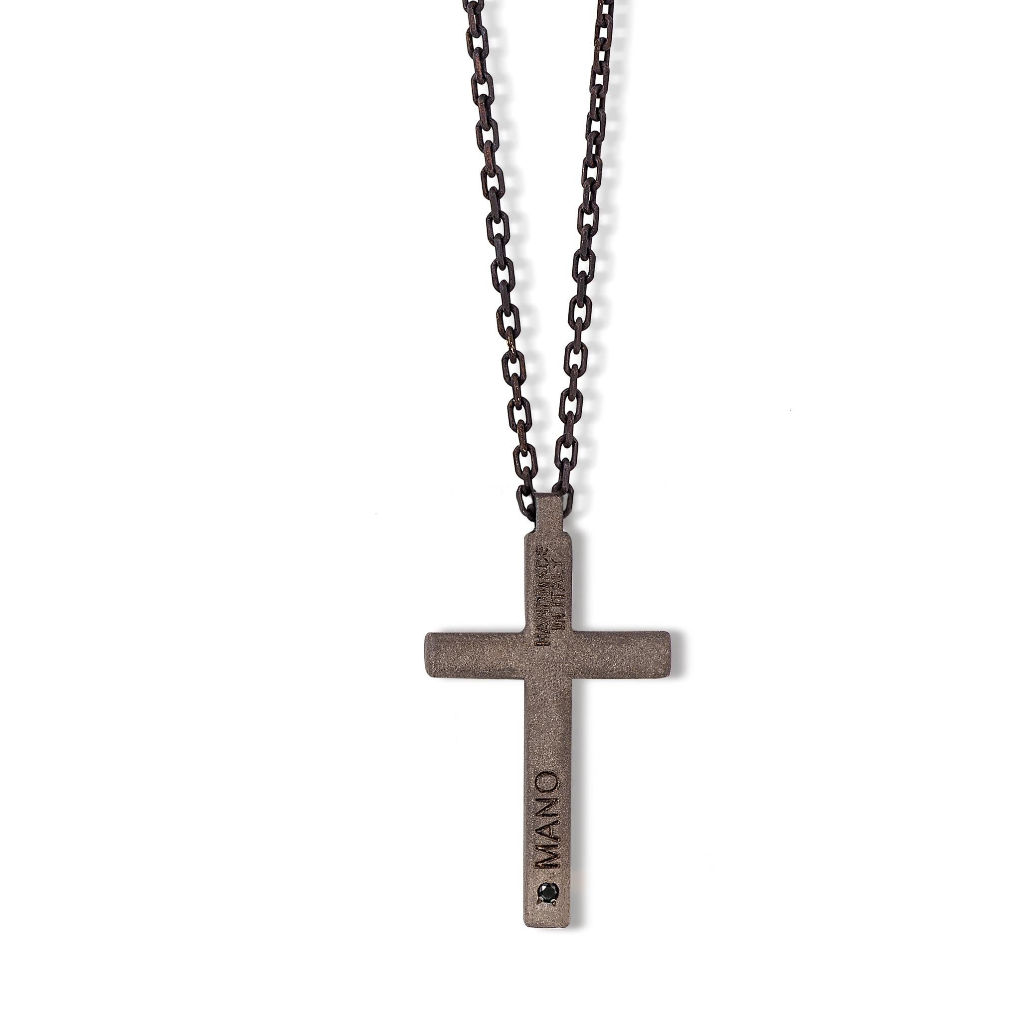 Men's Minimal necklace in titanium, black diamonds, 9 kt red gold. On the titanium cross, the central part of this necklace, are set 12 black diamonds for a total carat of 12 points, while on the back is a 1-point black diamond, a precious detail of