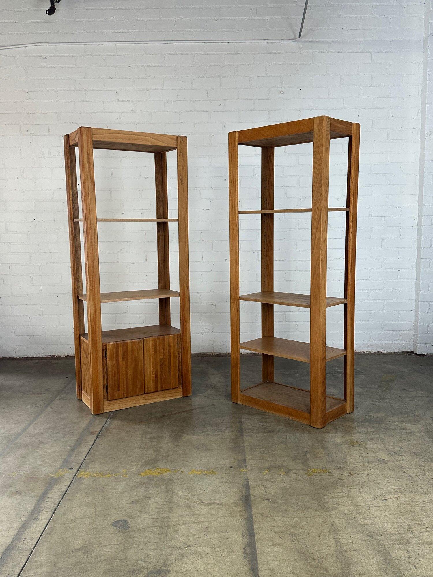 W30 D17.5 H76

Gently used vintage oak shelving. The pair has not been restored in house but overall shows well and has all original shelves. These consist of sold oak construction on frames but shelves seem to be veneered. 
ONLY ONE AVAILABLE, the