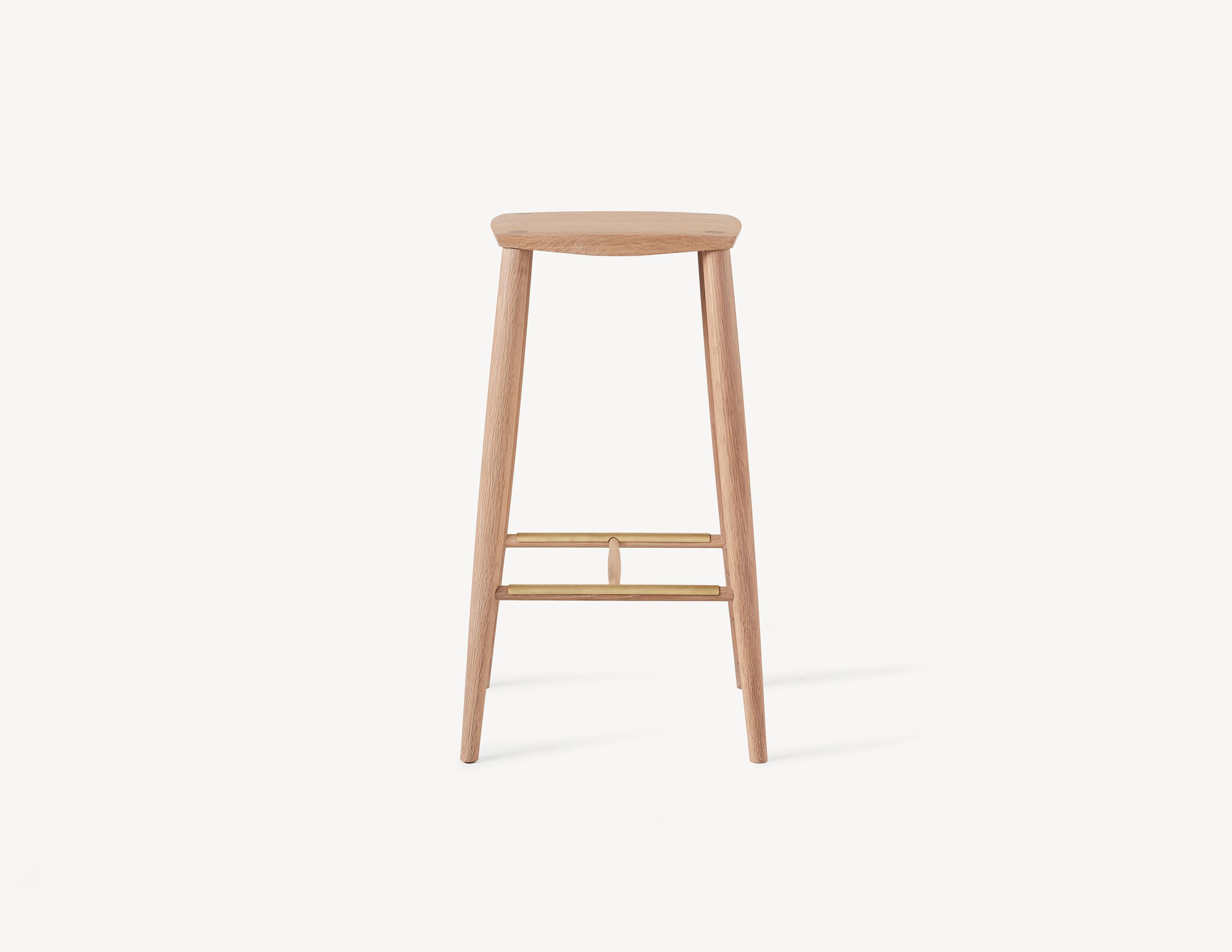 An instant Classic with a contemporary turned legs and a faceted top for comfort, this counter height stool will stand the test of time and only get better with age. A light and durable stool that features wedged through-tenons as well as pegged