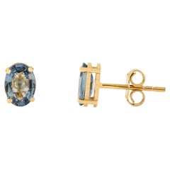 Boucles d
oreilles minimaliste en or jaune massif 14K avec saphir bleu ovale de 1,88 carat