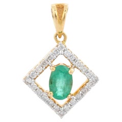 Pendentif minimaliste en or jaune 18 carats serti d'émeraudes et de diamants
