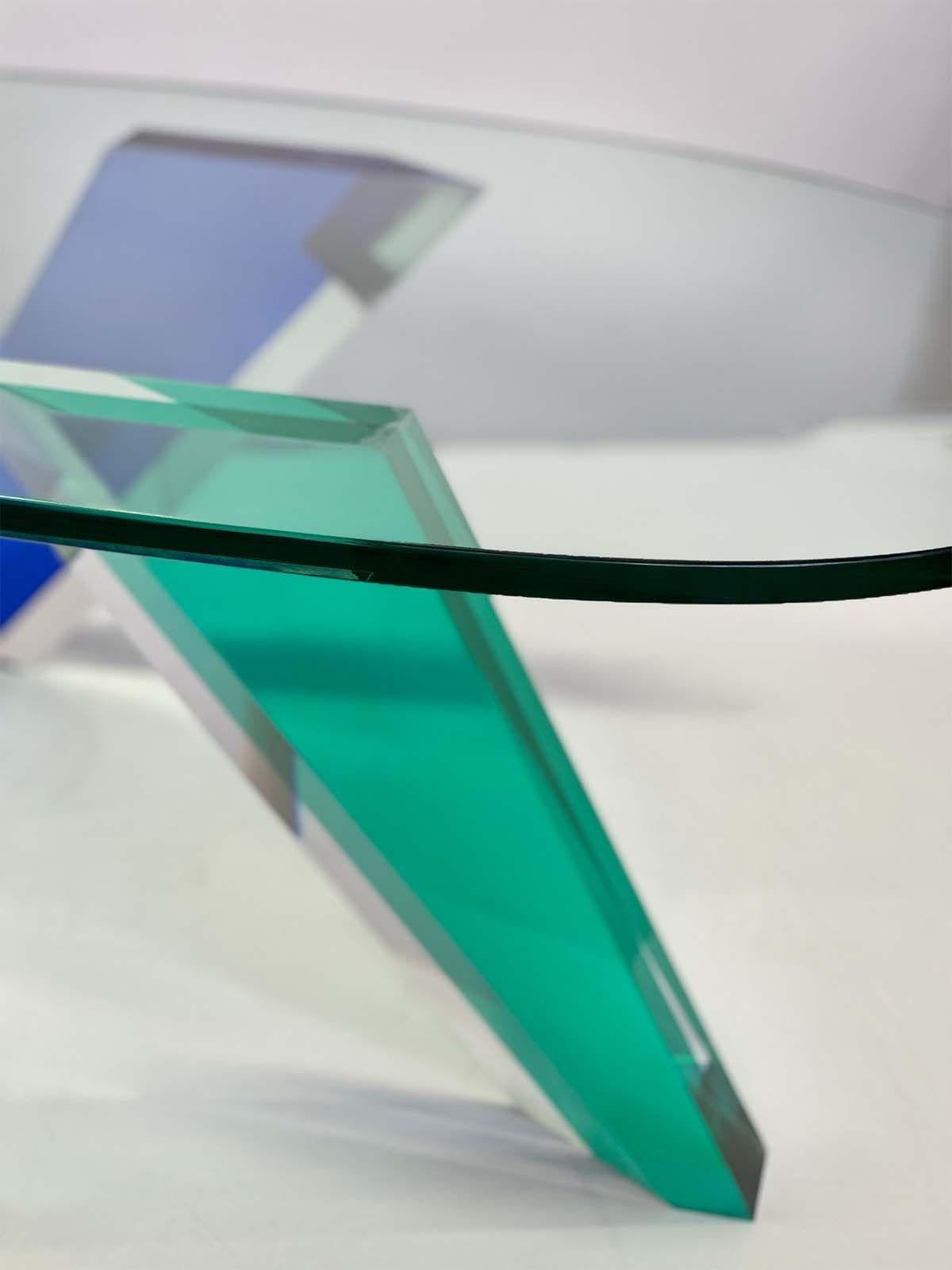 Minimalist acrylic coffee table with turquoise and blue tones by Vasa Mihich. Kidney shape glass top. 
Dimensions:
13.75