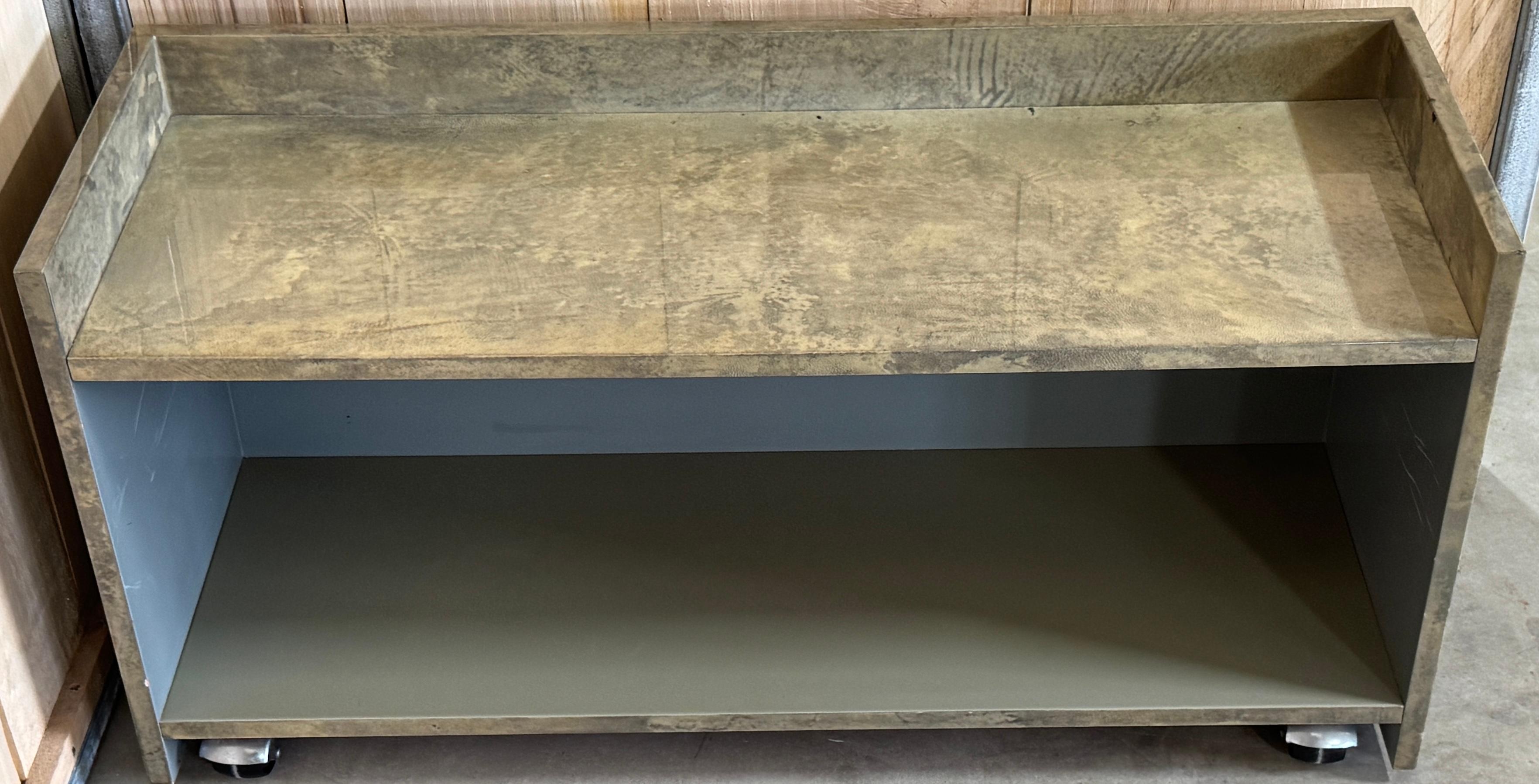 Minimalist Aldo Tura Green Goatskin Lacquered Bookcase/Shelf on Castors 

Italy, Circa 1970s

A striking minimalist Aldo Tura green goatskin lacquered bookcase/shelf on castors, crafted in Italy circa 1970s. A true tour de force of modernist design