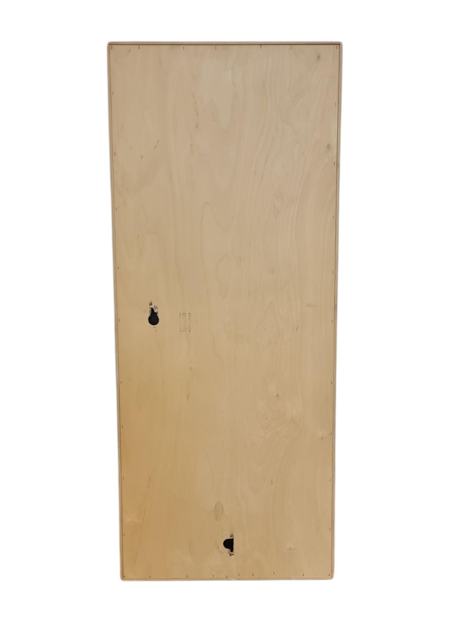 An iconic mirror designed by Alvar Aalto and retailed by Artek in Finland.  Very minimalist with straight lines and finger joints. The mirror has holes in the back in a way that enables one to hang it both vertically or horizontally. The hanging