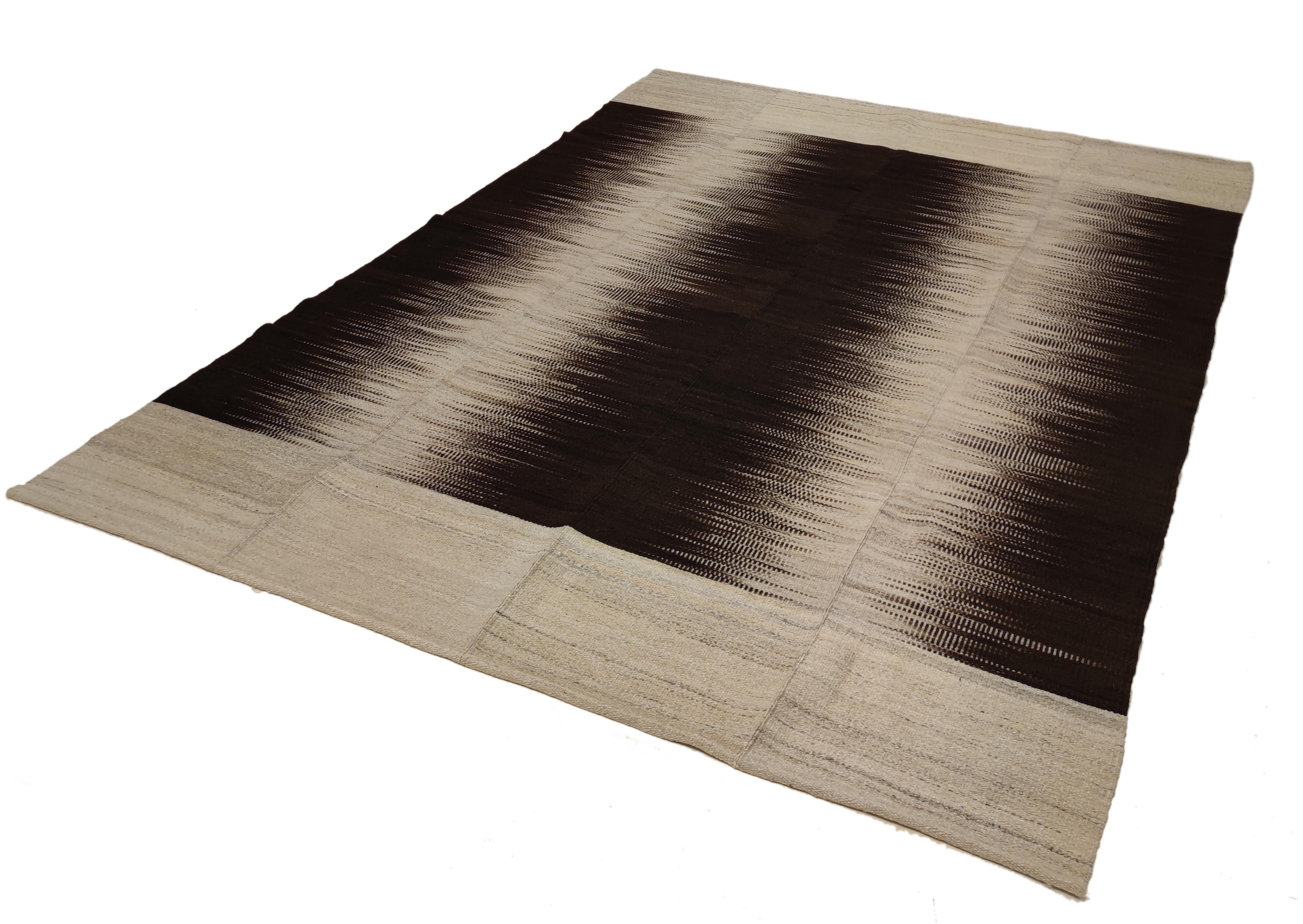 A stunning contemporary kilim from central Anatolia, woven in three panels using the best quality hand-spun wool and natural dyes. The design is inspired by the antique flat-weaves originating from the Mazandaran region, near the Caspian Sea, which