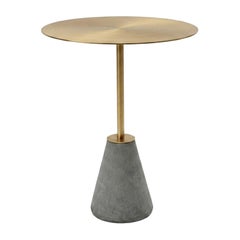 Minimalist and contemporary UM Bistro Table in brass and black concrete