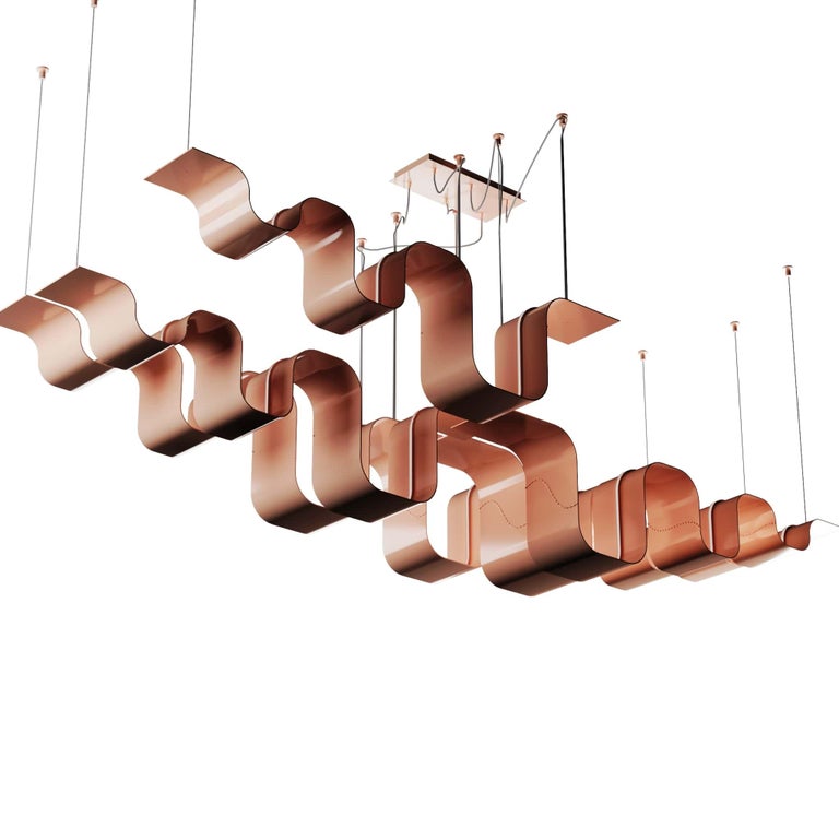 Ribon Suspension Lamp Rose Gold is a modern suspension lamp with a futuristic flair.
The sophisticated chandelier is very light and airy to bring movement, resulting from simple materials and simple construction.
Luxurious yet effortlessly, the