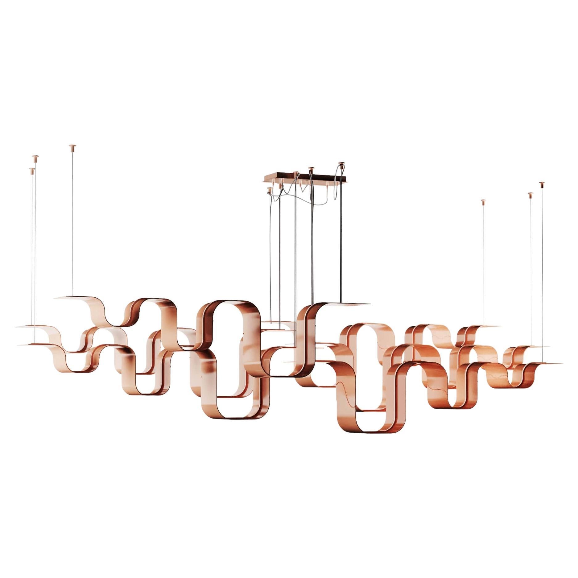 Minimalistische und moderne Hängeleuchte aus Roségold aus Messing mit futuristischem Flair