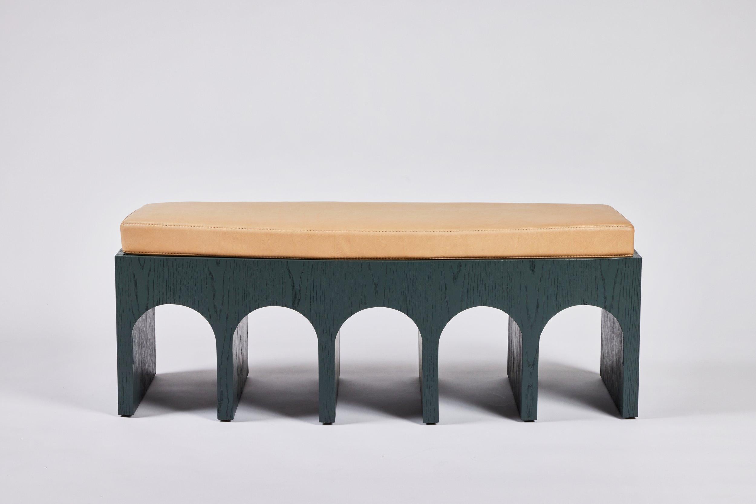 Martin & Brockett's Arcade Bench 48” in Lacquer is a nod to the ancient Roman architectural form- a succession of contiguous arches supported by columns. It features a slight convex curvature at the face and natural grain texture.

Shown in Lichen