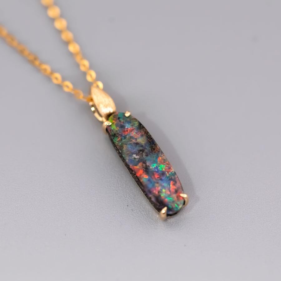 Minimalist Australian Boulder Opal Necklace Pendant 18K Yellow Gold.


Free Domestic USPS First Class Shipping! Free Gift Bag or Box with every order!

Opal—the queen of gemstones, is one of the most beautiful gemstones in the world. Every piece of