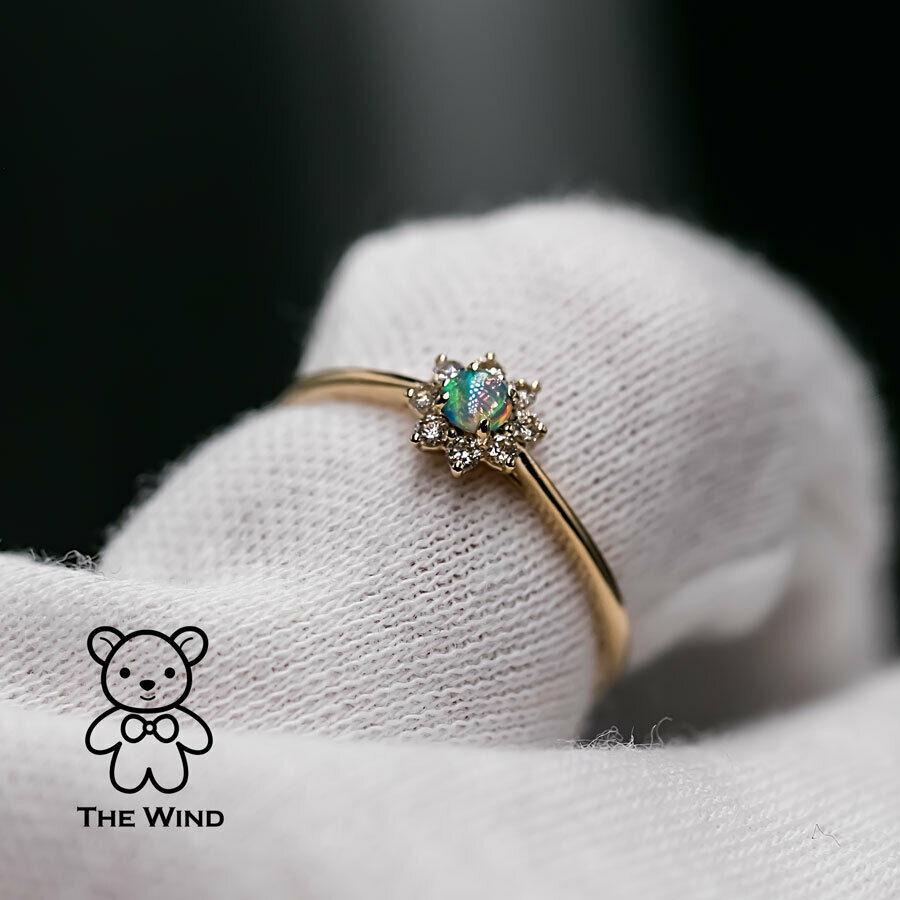 Minimalist Australian Solid Opal Diamond Hola Ring 18K Yellow Gold.


Free Domestic USPS First Class Shipping! Free Gift Bag or Box with every order!

Opal—the queen of gemstones, is one of the most beautiful gemstones in the world. Every piece of