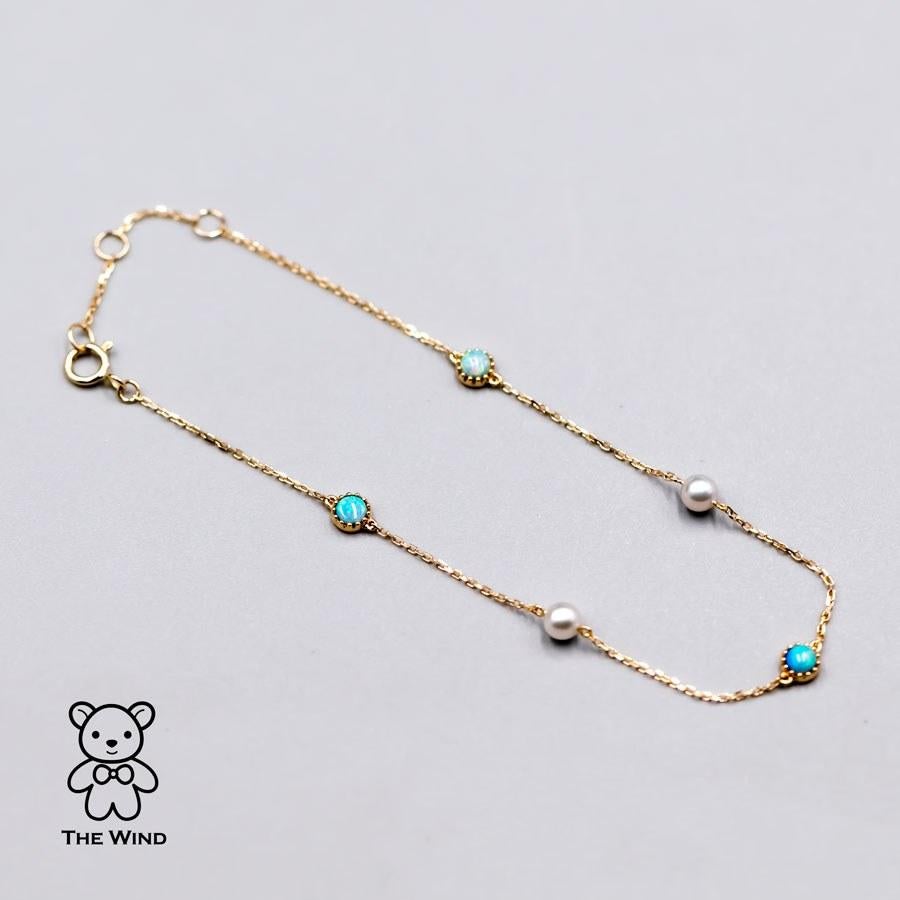 Bracelet minimaliste en or jaune 18k avec perles et opales australiennes.


Expédition nationale gratuite par USPS First Class !  Garantie limitée d'un an gratuite !  Sac ou boîte cadeau gratuit avec chaque commande !



L'opale, la reine des