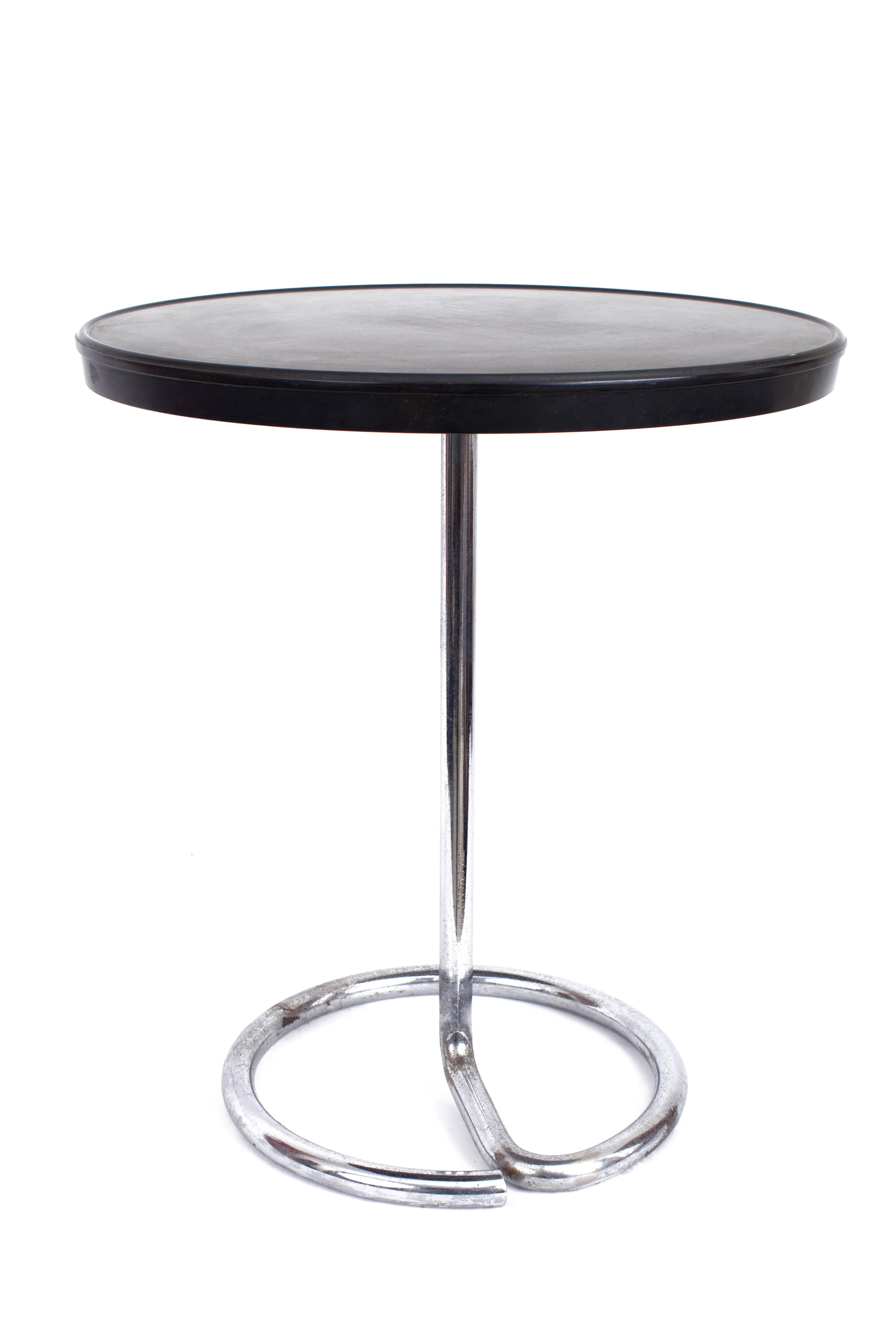 René Herbst (1891–1982), attributed.

Minimalist chromed tubular steel end table with Bakelite top for Stablet, attributed to René Herbst.

Stamped Stablet on base.