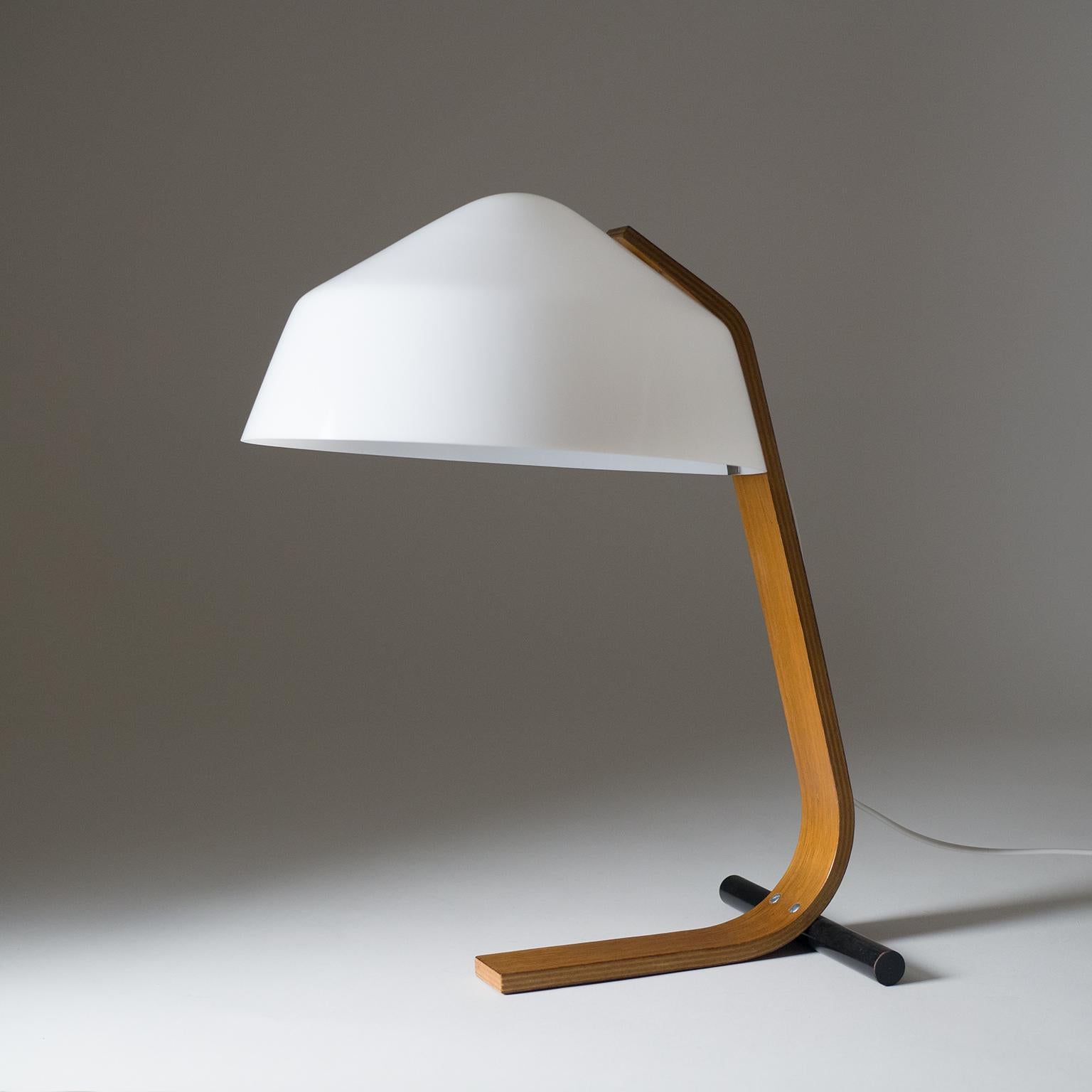Beautiful bent plywood table or desk lamps with a large acrylic shade by Temde, 1960s. Very clean lines with a sleek silhouette. The 'T-base' is complimented by a black lacquered steel rod. One original E27 socket with new wiring and original