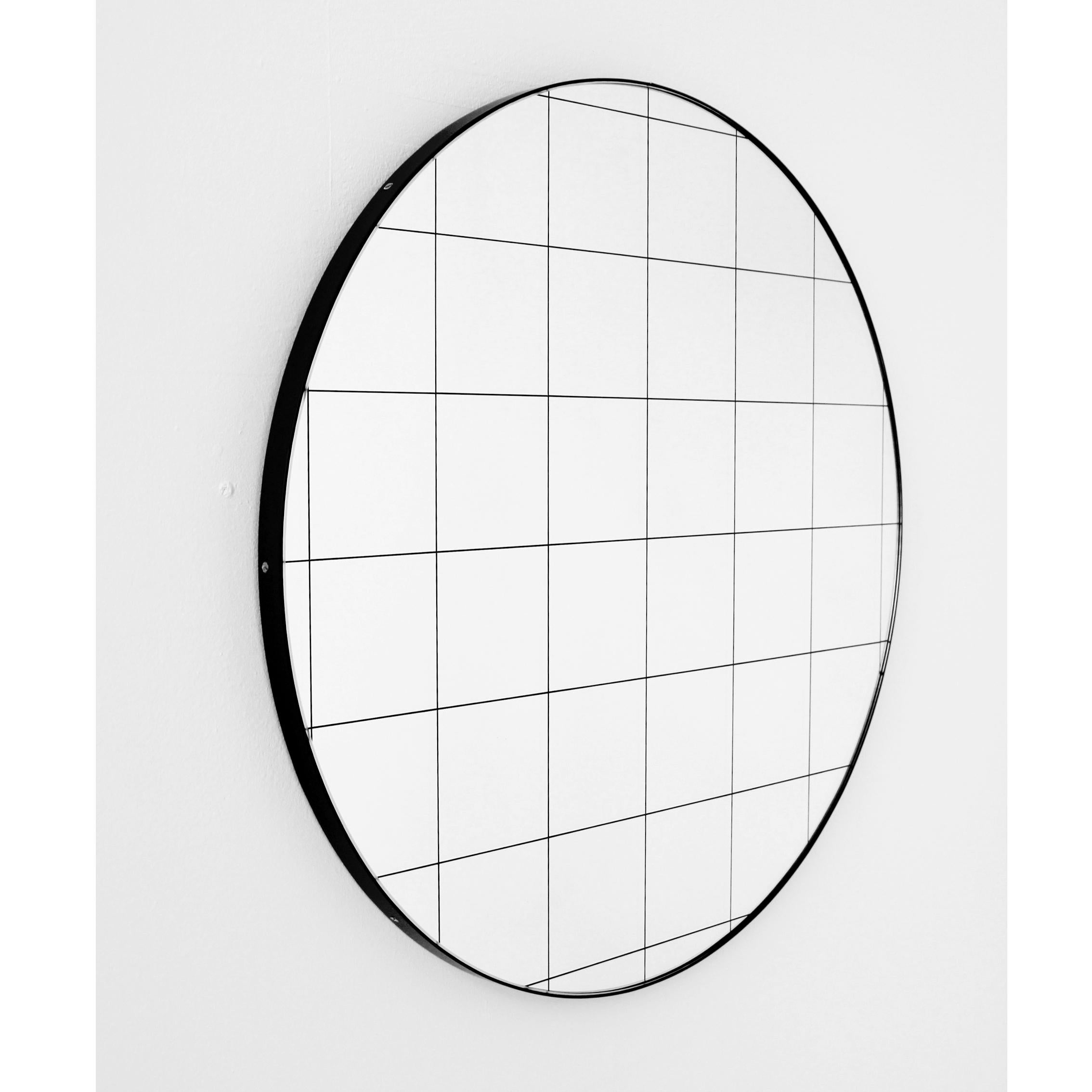 Delightful crafted silver round mirror with an elegant black frame and black grid.

Ideal above a console table in the hallway, above a beautiful fireplace, in the bedroom or in the bathroom.

Design tip: Looks stunning used as a cluster in