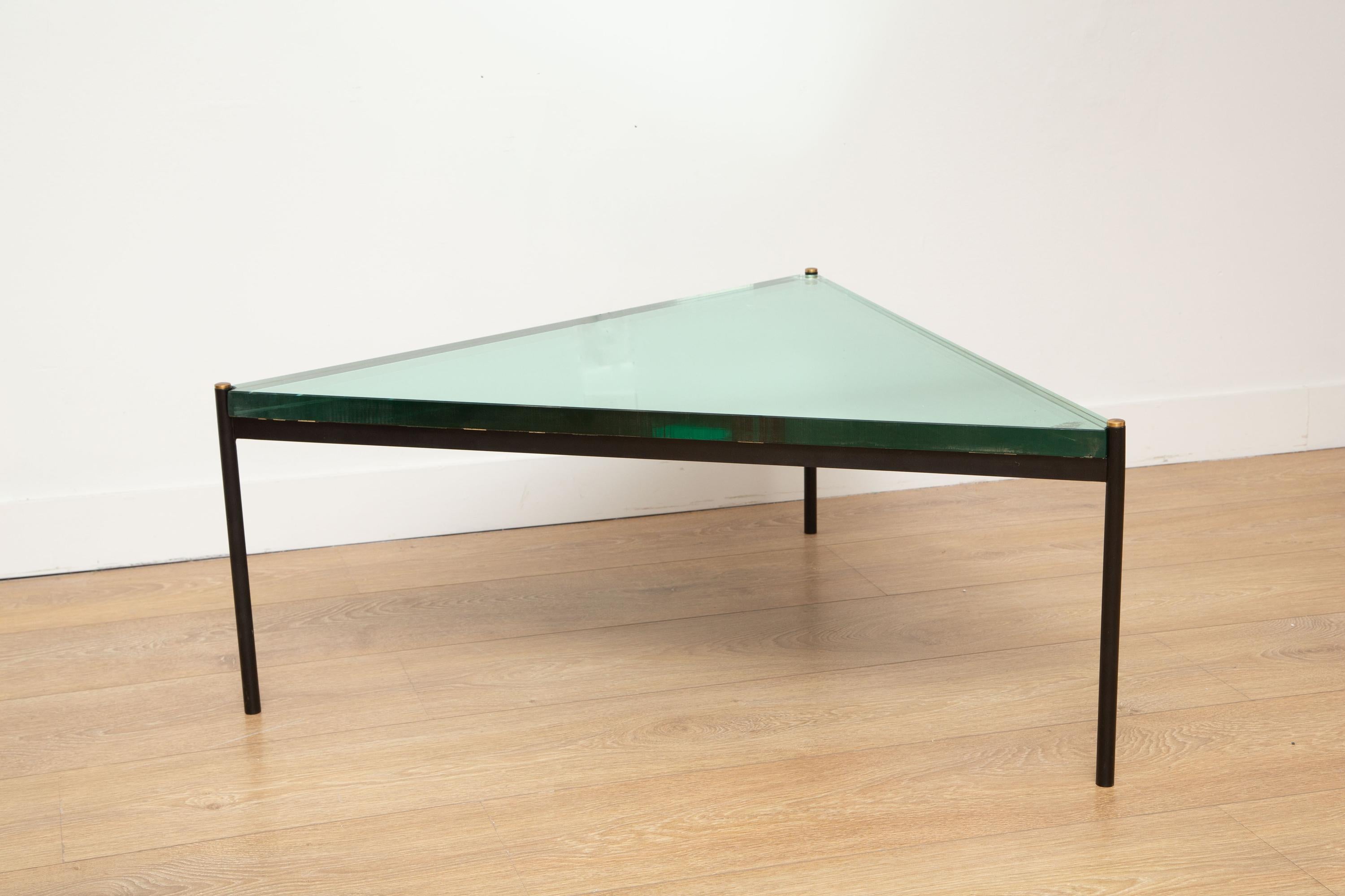 Minimalist black metal and glass coffee table, Italy 1970
Black enameled tubular base with brass accents
Rare 1'1/4 (3cm) reversed acqua green mirror, glass top
Probably by Fontana Arte
Available to view in-situ in our Miami gallery


