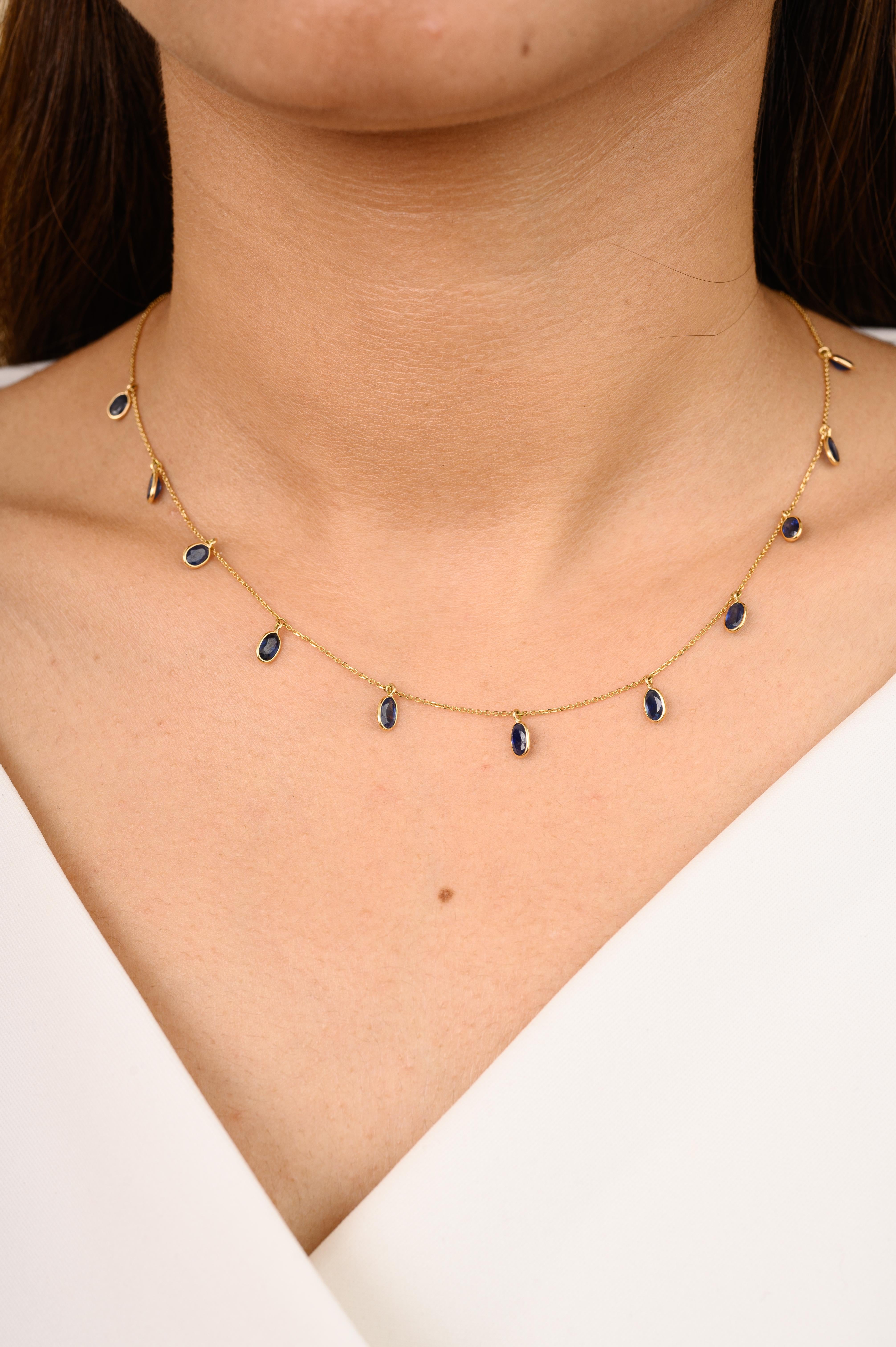 Minimalist Blue Sapphire Charm Necklace in 18K Gold studded with oval cut blue sapphire. This stunning piece of jewelry instantly elevates a casual look or dressy outfit. 
Sapphire stimulate concentration and reduces stress.
Designed with a oval cut