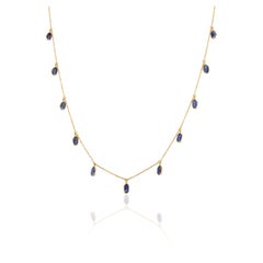 Minimalistische blaue Saphir-Charm-Halskette aus 18 Karat Gelbgold für sie gefertigt